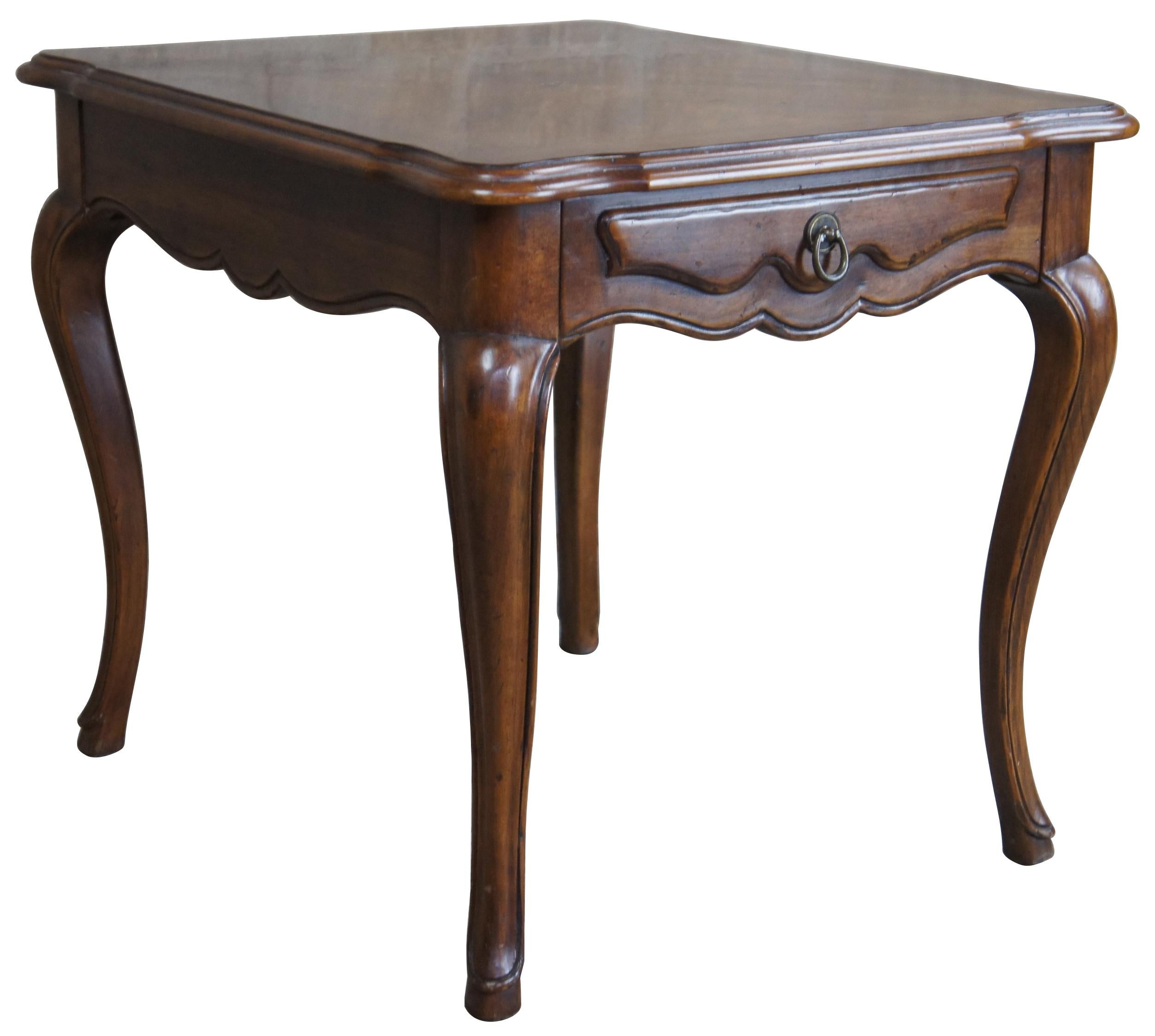 John Widdicomb end table. Made from walnut with a rectangular form over cabriole legs, Circa 1980s. Features a matchbook veneered top and drawer. Draws inspiration from Louis XV and French Country / Provincial Styling. John Widdicomb of Grand