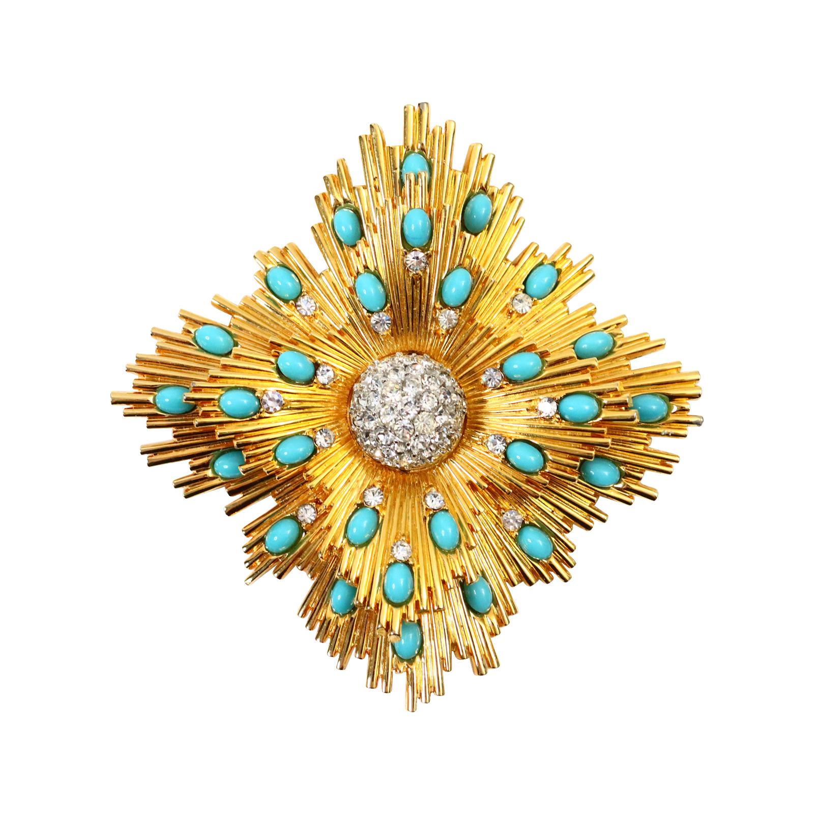 Vintage Jomaz Gold Diamante and Faux Turquoise Brooch Circa 1960s.  Now this is a brooch. It has two layers that seem to elevate slightly upwards.  The piece in the middle is domed pave and then have pieces of faux turquoise all around as well as