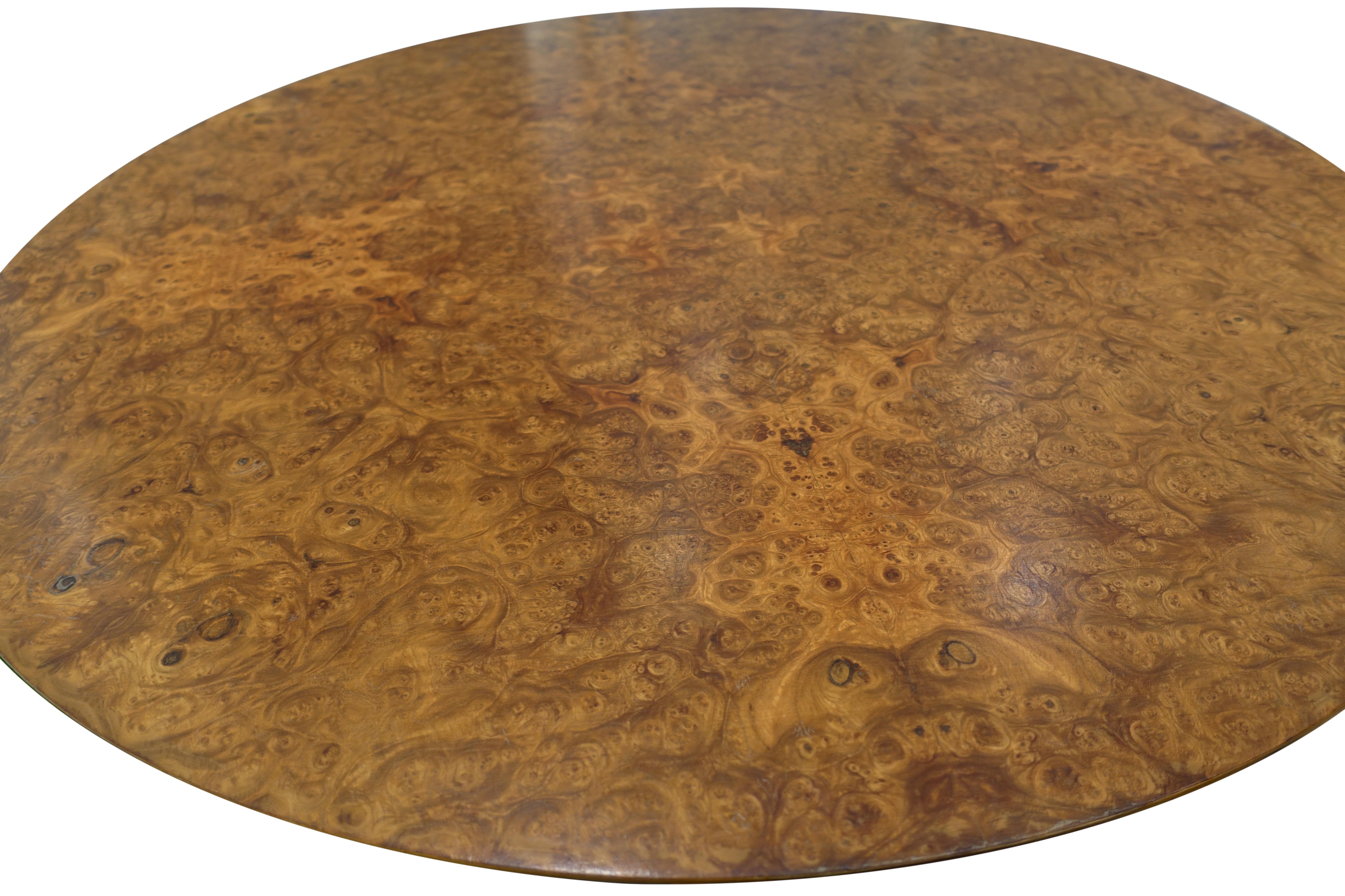 Vintage Josef Frank for Svenskt Tenn table with walnut legs and richly patterned amboyna burl wood top. The table features a pedestal base with three feet that support the table in a stable, functional manner. Unique table height, perfect for side