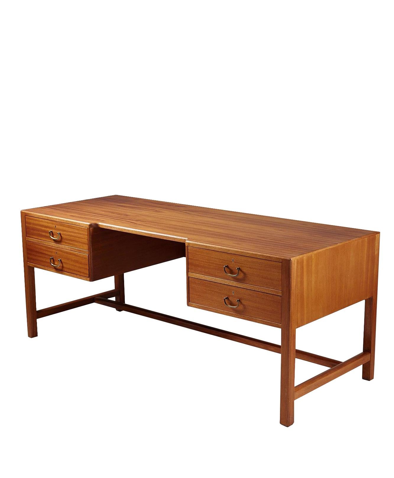 Vintage Josef Frank sweeping crotch mahogany four-drawer desk in good condition with brass hardware; circa 1932.

