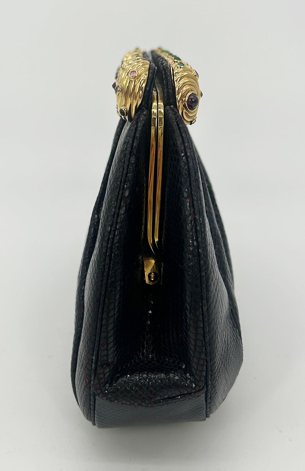 Vintage Judith Leiber Black Lizard Gold Gemstone Top Clutch in fair condition. Black lizard leather exterior trimmed with gold hardware and tiny multicolor gemstones. Side pull latch closure opens to a black nylon lined interior with one side slit
