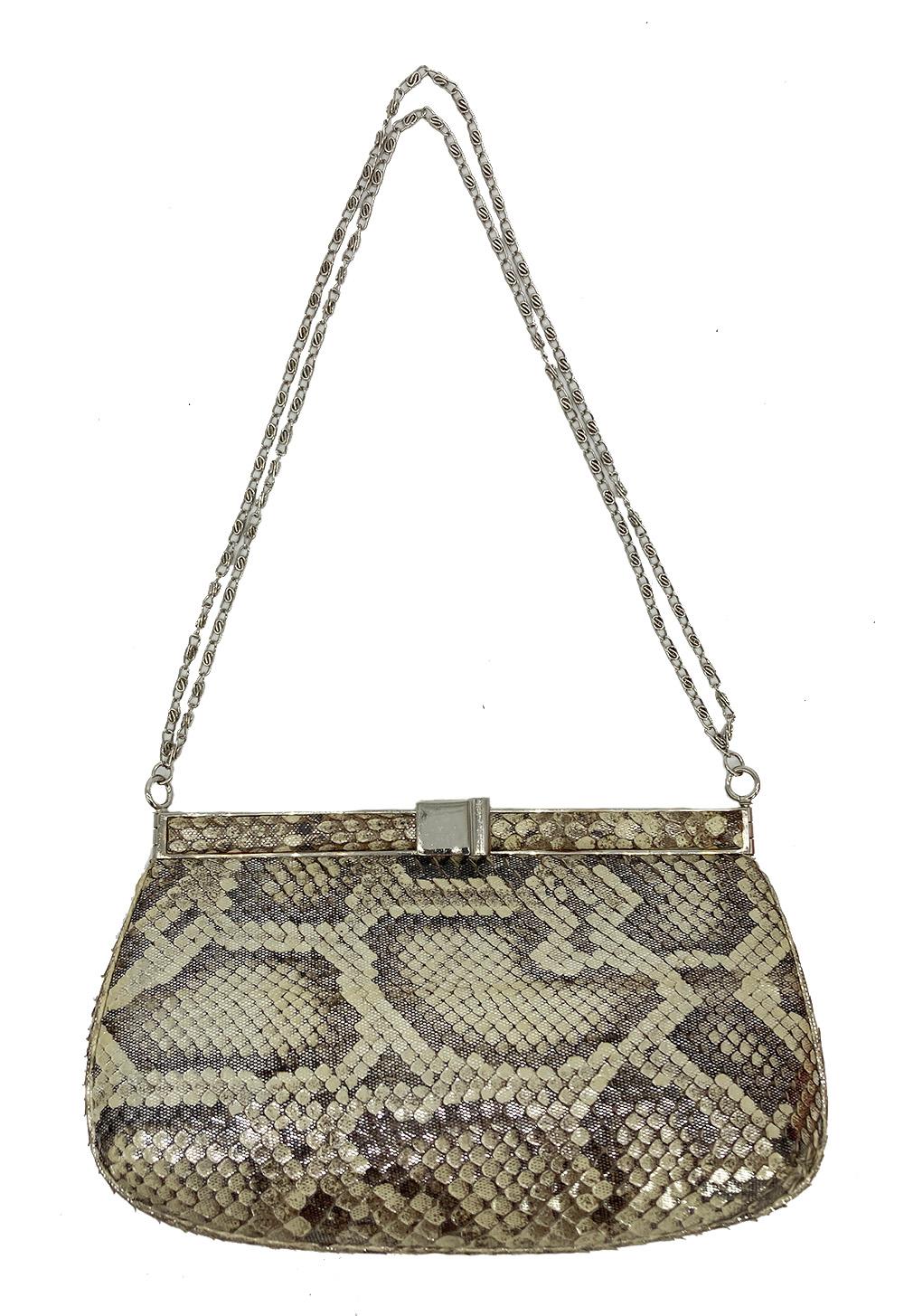 Judith Leiber Metallic Snakeskin Shoulder Bag in good condition. Metallic beige and gray snakeskin exterior trimmed with silver hardware and an attached chain shoulder strap. Top lift latch closure opens 4 top hinges to a beige satin interior with 2