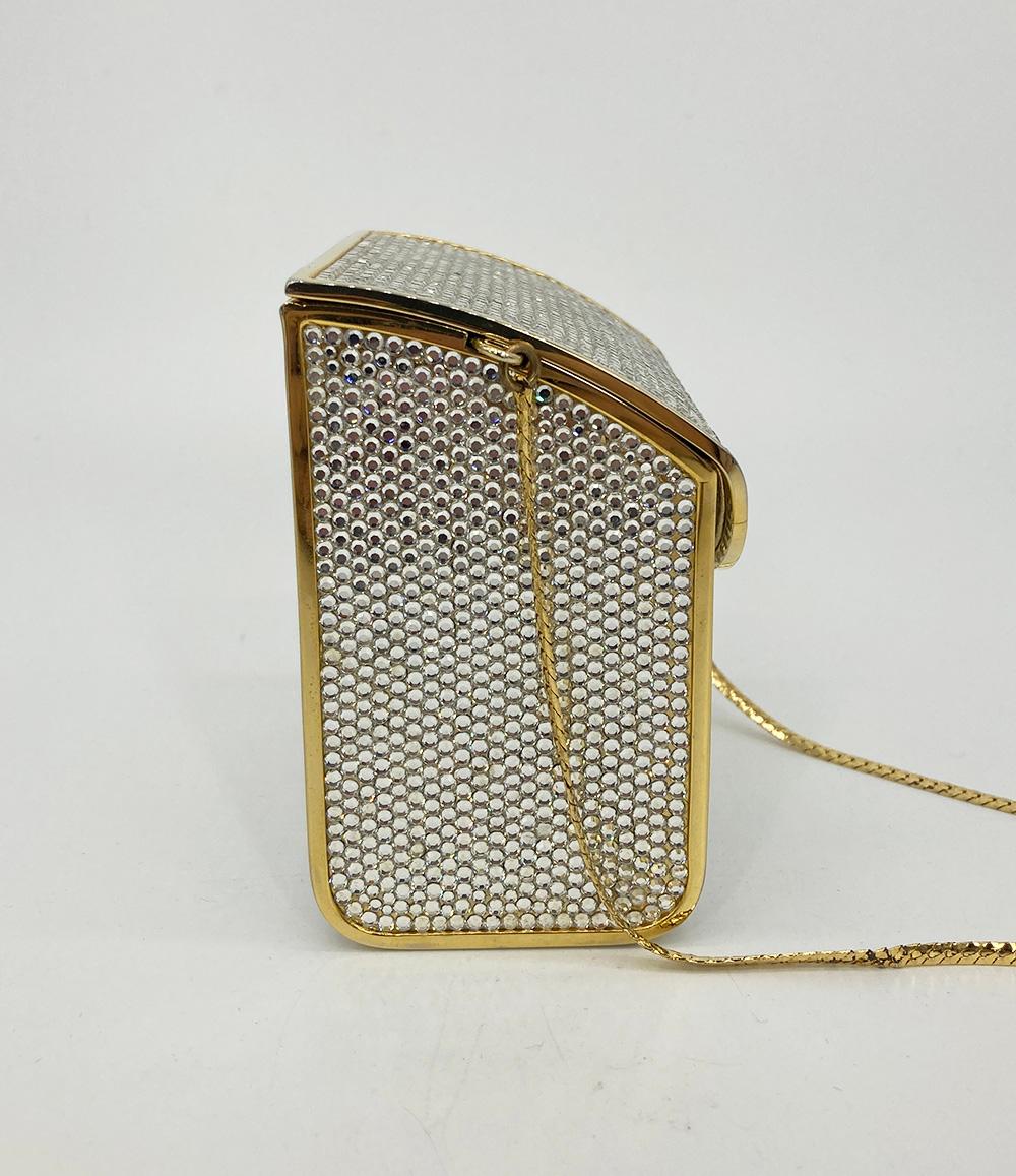 Vintage Judith Leiber Top Flap Crystal Shoulder Bag Minaudiere in excellent condition. Clear swarovski crystals with gold hardware. Unique top flap design. Gold leather interior. Attached gold chain shoulder strap. No stains smells or missing
