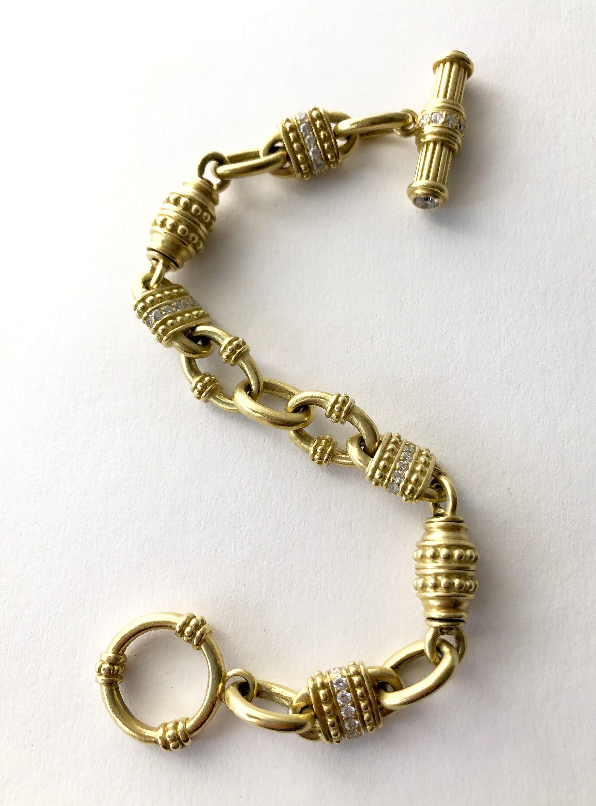 Vintage 18k gold and diamond chain link bracelet attributed to Judith Ripka.  Bracelet measures 8.5