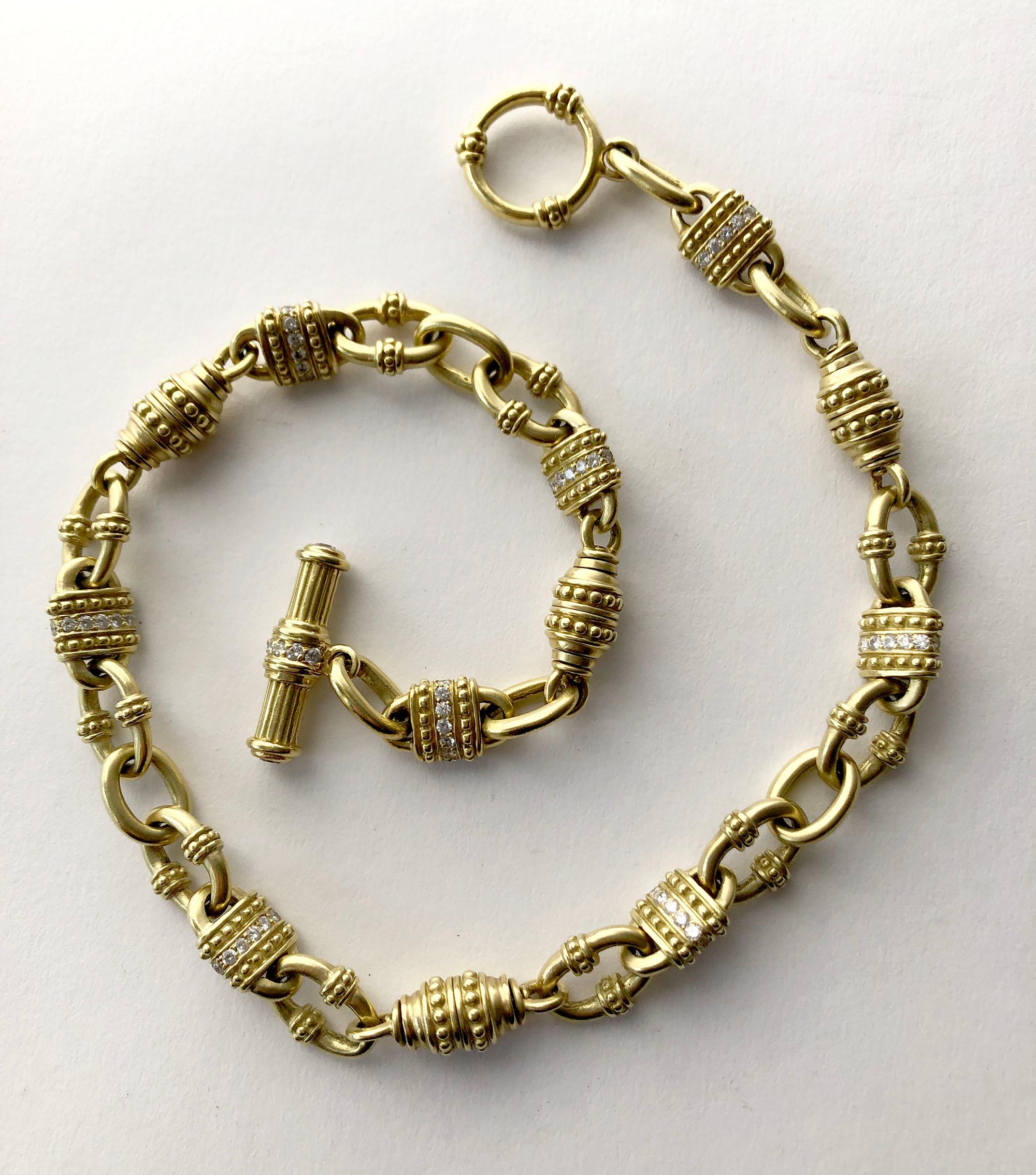 Vintage 18k gold and diamond chain link necklace attributed to Judith Ripka.  Necklace measures 18