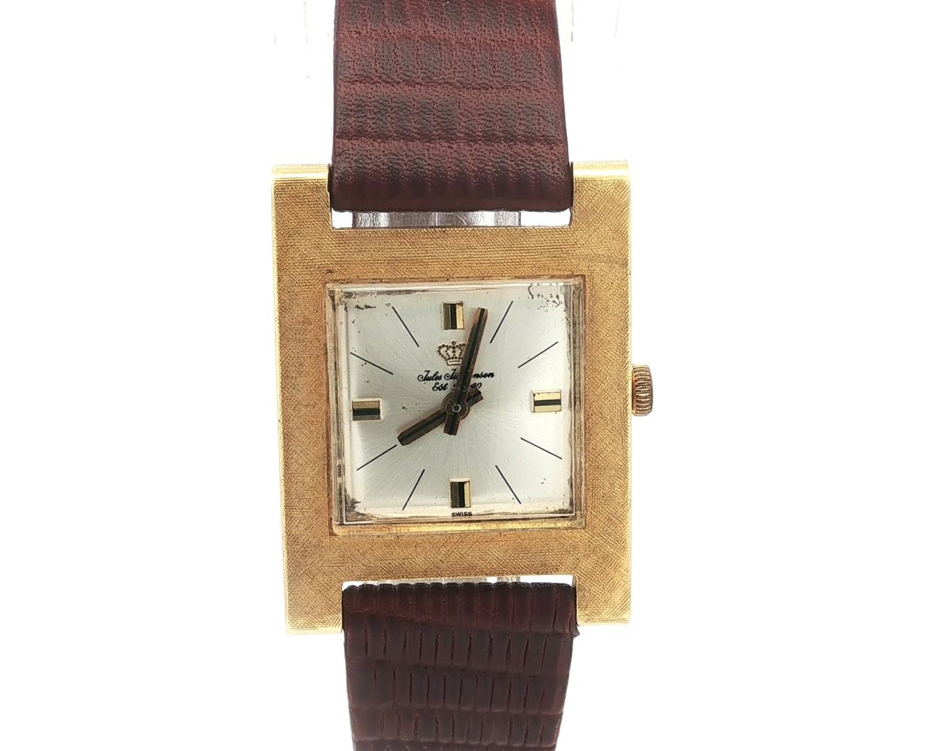 Watchmaker: Jules Jurgensen
Movement: Mechanical - Hand Winding - 17 jewels - Swiss Made
Case Material: Solid 18k Yellow Gold
Gross Weight:	17.7 Grams (including case, movement, and strap)
Case Width: 24mm (not including crown)
Case Height: 32.5mm