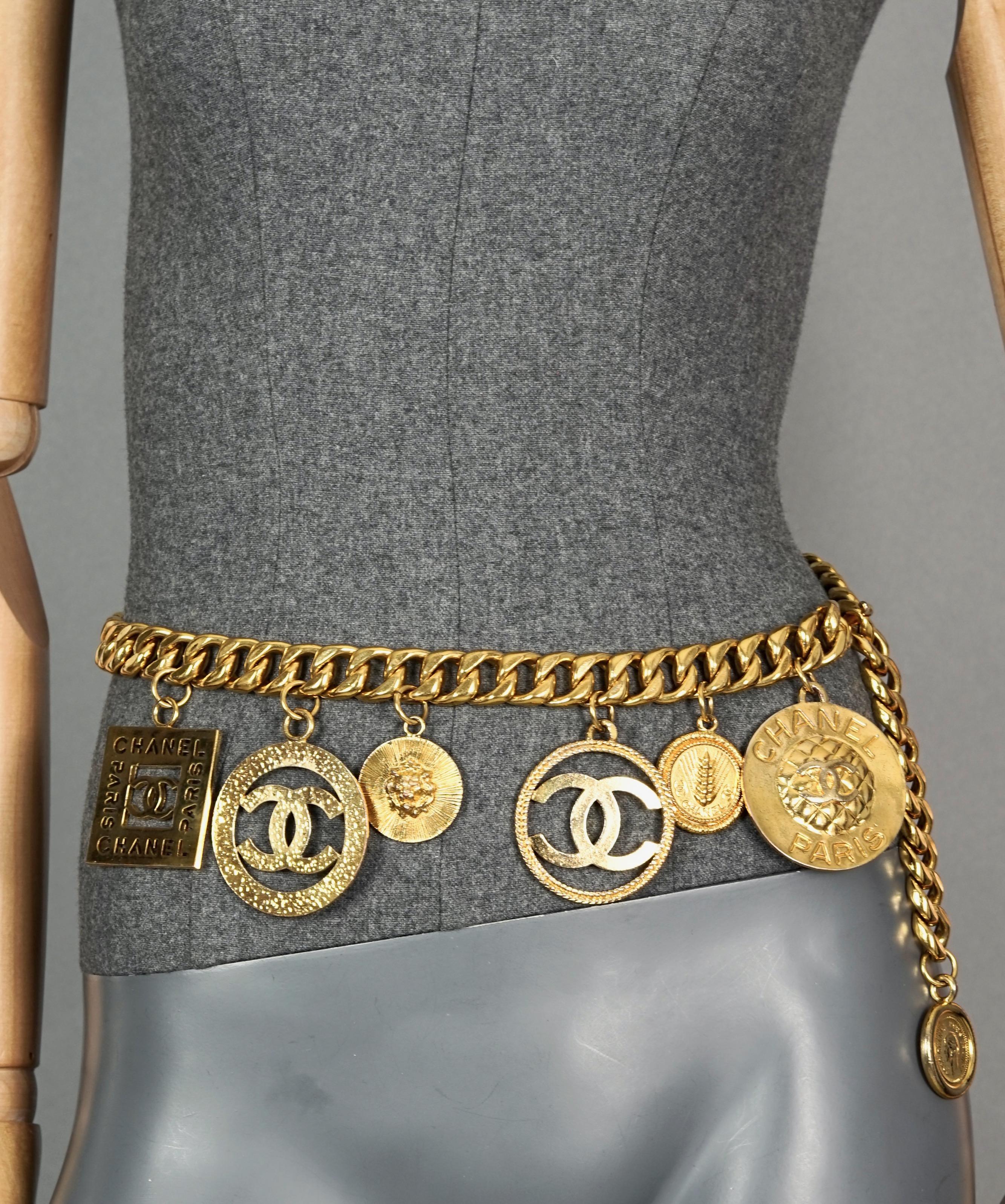 Vintage Jumbo CHANEL Iconic Logo Medallion Charm Necklace Belt

Measurements:
Largest Charm Drop: 3.15 inches (8 cm) 
Overall Length: 33.46 inches (85 cm) adjustable

Features:
- 100% Authentic CHANEL.
- Chunky chain and 7 medallion charms .
-