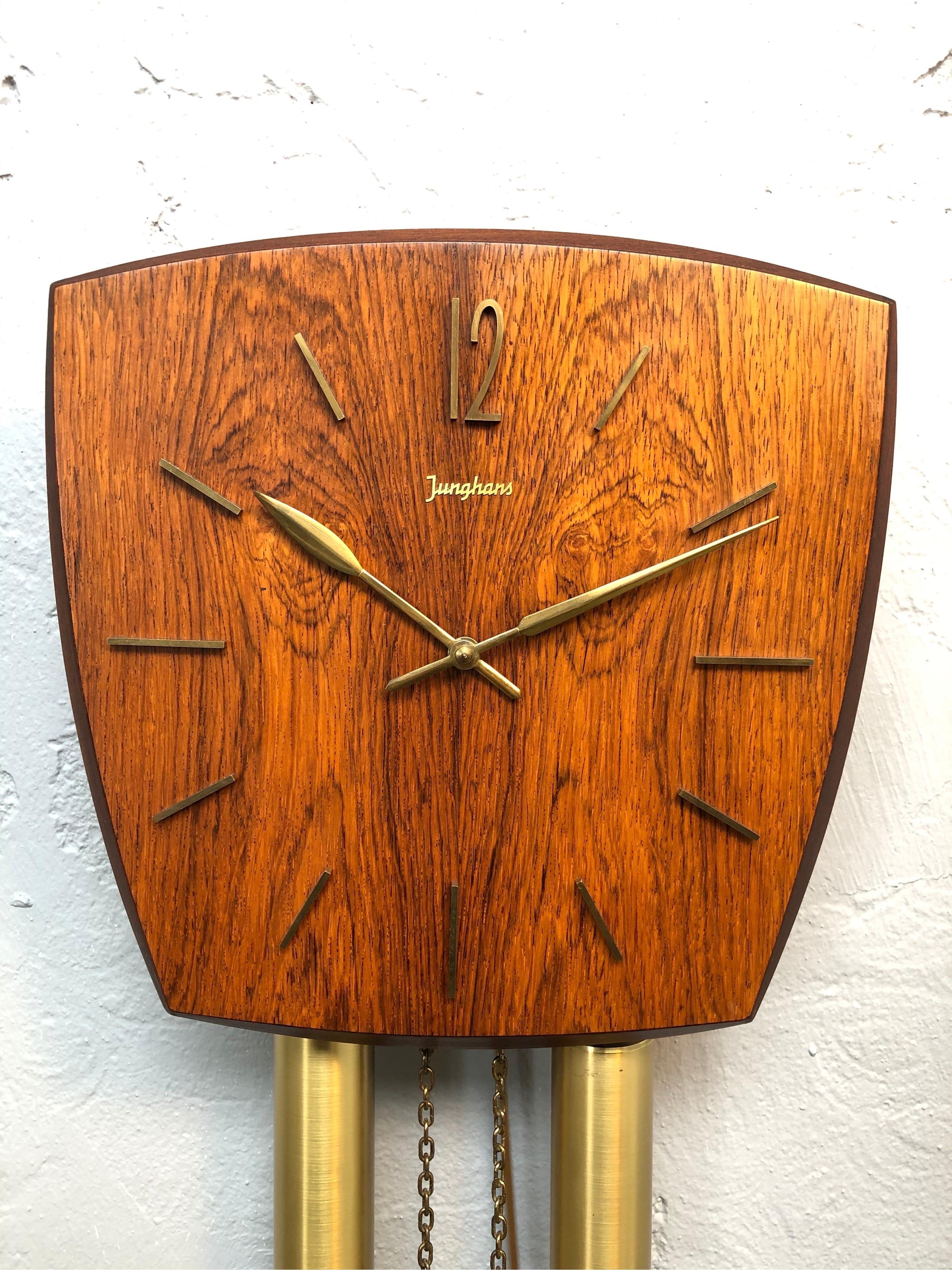 Vintage Junghans pendulum wall clock from the 1960s in hardwood veneer with brass fittings.
In lovely working condition and with chimes on the half and whole hour that can be switched off if so desired.
Please see the video.
  