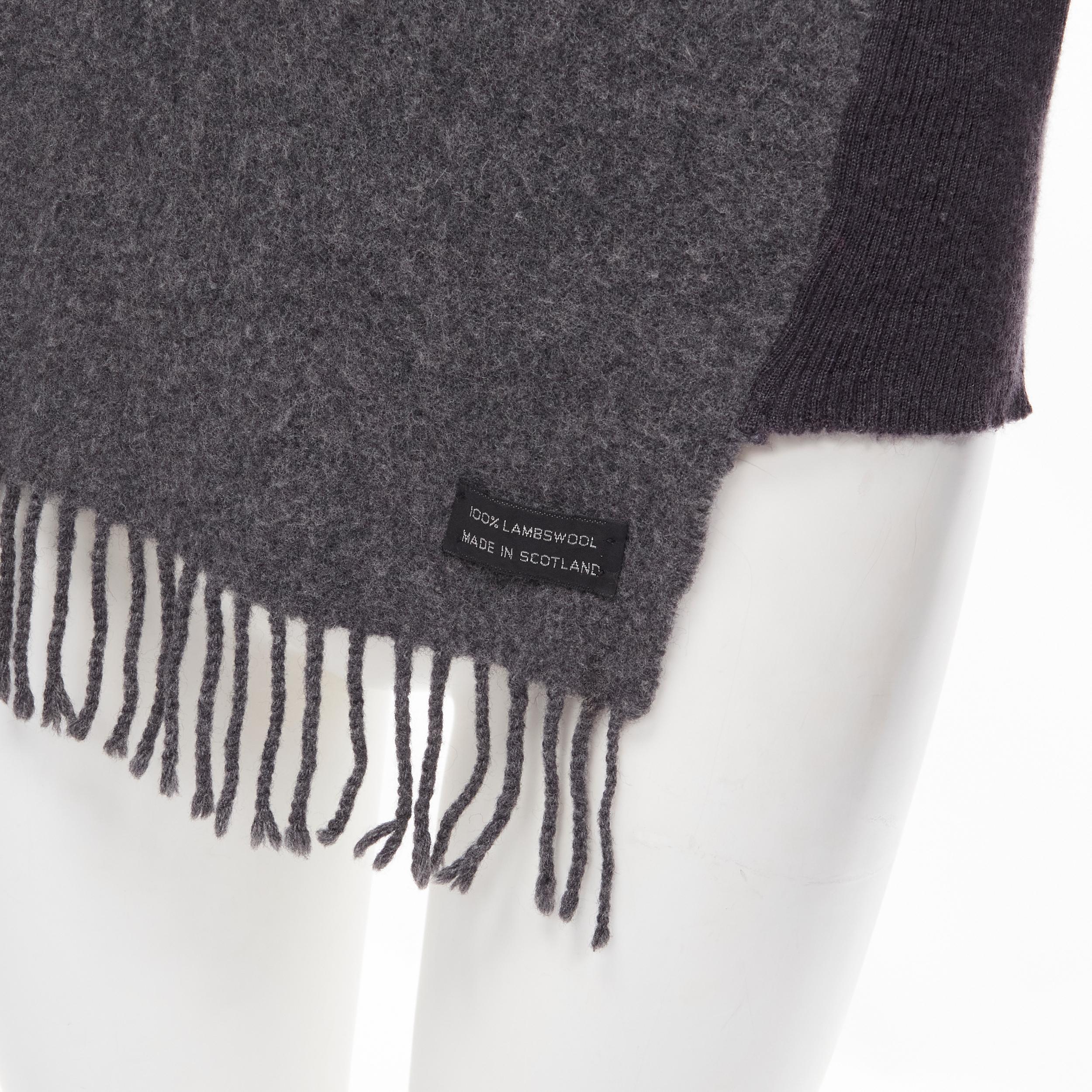 vintage JUNYA WATANABE 1993 grey attached wool scarf ribbed sweater S 
Reference: CRTI/A00401 
Brand: Junya Watanabe 
Collection: 1993 
Material: Wool 
Color: Grey 
Pattern: Solid 
Extra Detail: Attached wool scarf at front panel. Exposed label at
