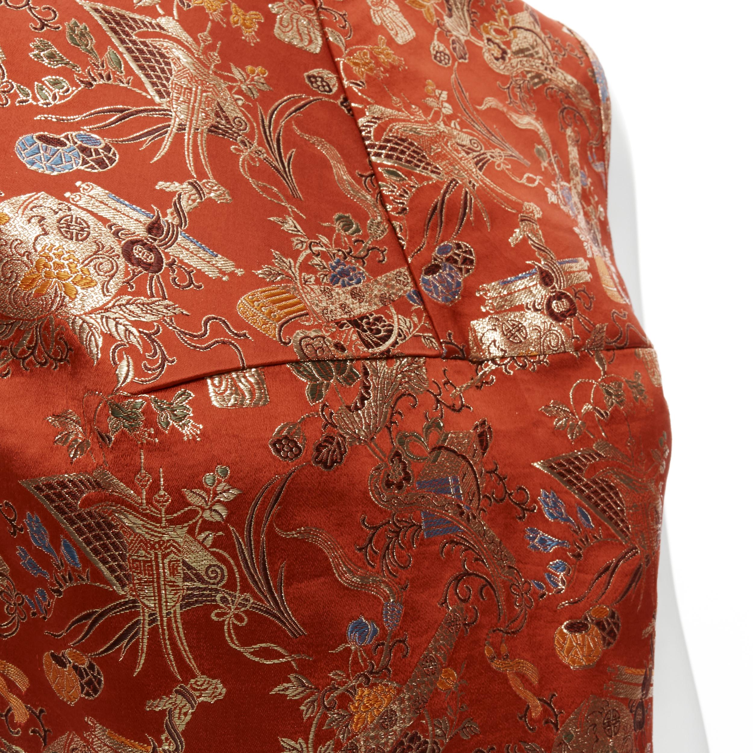 vintage JUNYA WATANABE 1995 red gold lurex oriental chinoiserie crop top S 
Reference: CRTI/A00337 
Brand: Junya Watanabe 
Designer: Junya Watanabe 
Collection: 1995 
Material: Rayon 
Color: Red Pattern: Abstract 
Closure: Zip 
Extra Detail: Zip