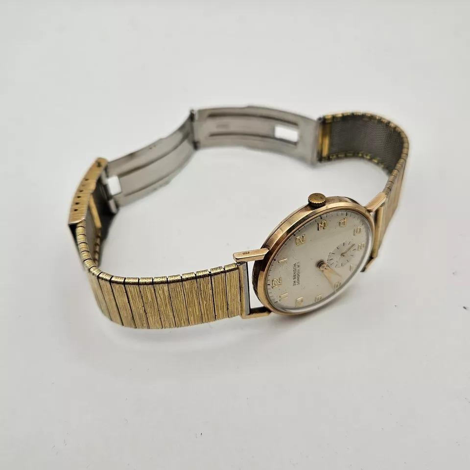 Vintage JW Benson London W1 9ct Gold Gents Wristwatch 17 Jewels

The Watch is in full working order and is being sold with 1 years timing guarantee and has been fully serviced. The back is stamped 9ct 375 on the back of the case
The strap is brand