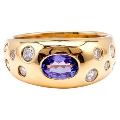 Anello Vintage Kabana con diamante e tanzanite in oro giallo 14K