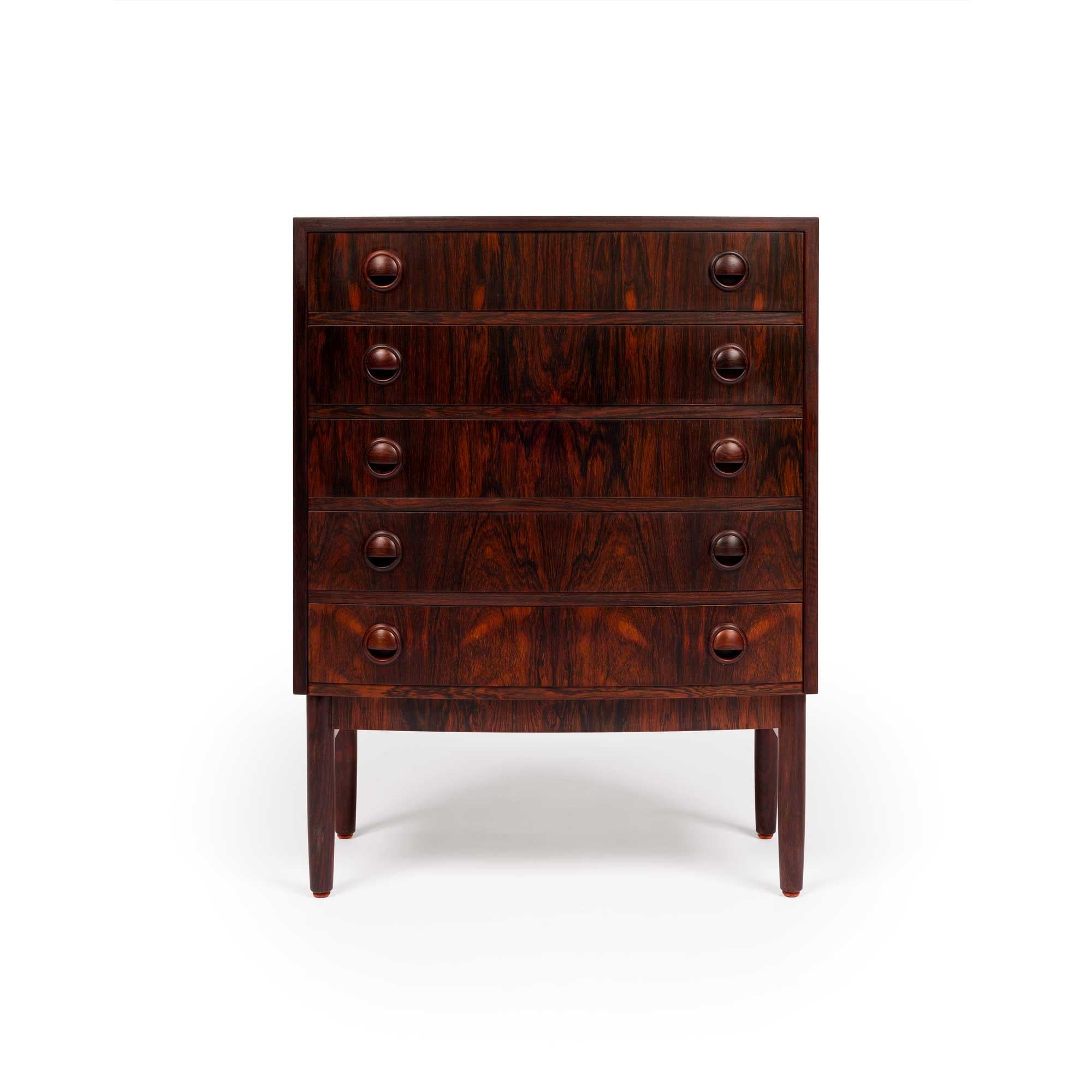 Kai Kristiansen is a renowned Danish furniture designer celebrated for his contribution to the mid-century modern movement. Born in 1929, he began his career as a cabinetmaker and later trained at the prestigious Royal Danish Academy of Fine Arts