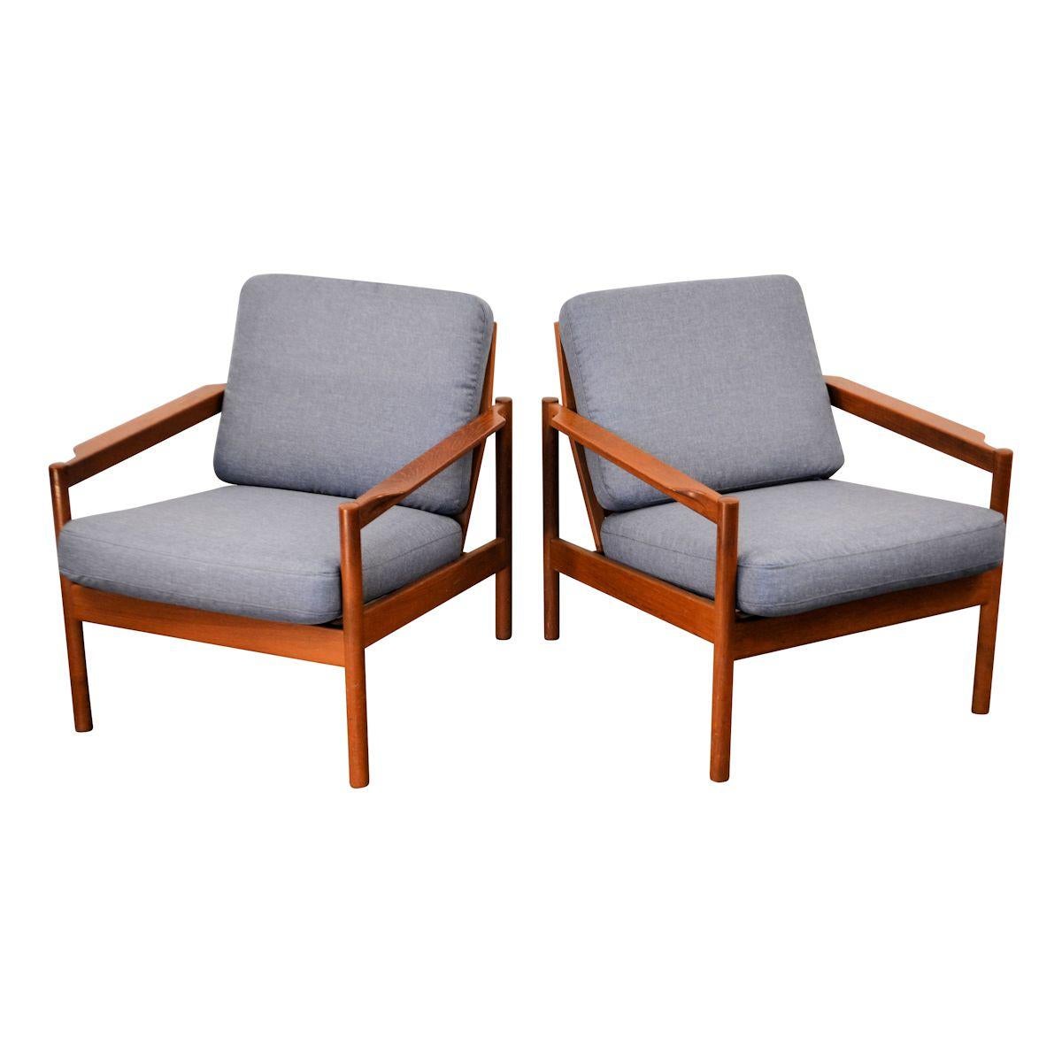 Set of two vintage teak easy chairs by Danish top designer Kai Kristiansen for Magnus Olesen. Kristiansen is recognized as one of the most talented Danish designers from the Danish mid-century period. His designs, with their innovative aesthetics