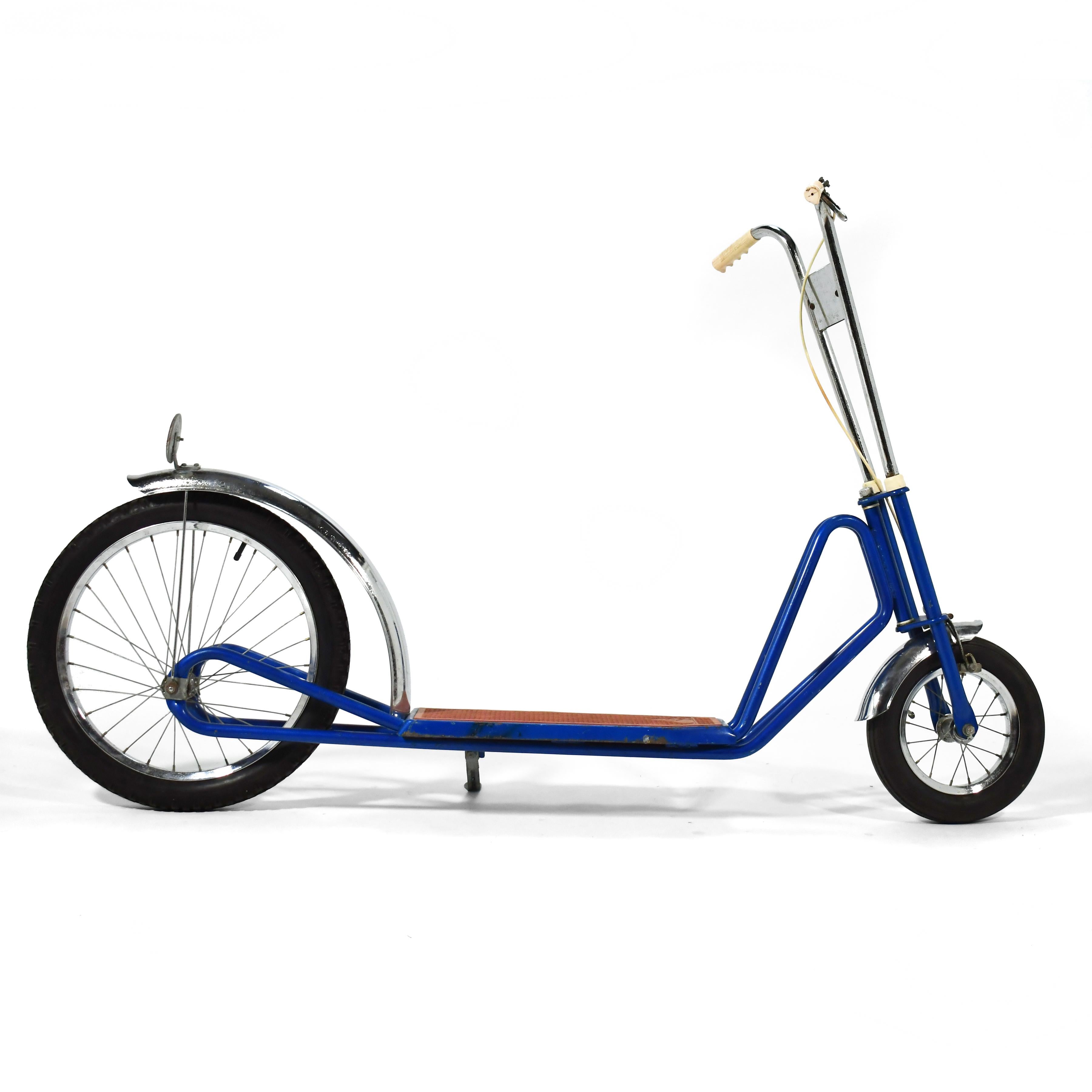 This rare scooter from 1969 is a re-imagining of a design that originated in 1928. It's an eccentric-hub scooter that is powered by the rider bouncing up and down on the platform, using their momentum to drive the off-center rear wheel.

With its