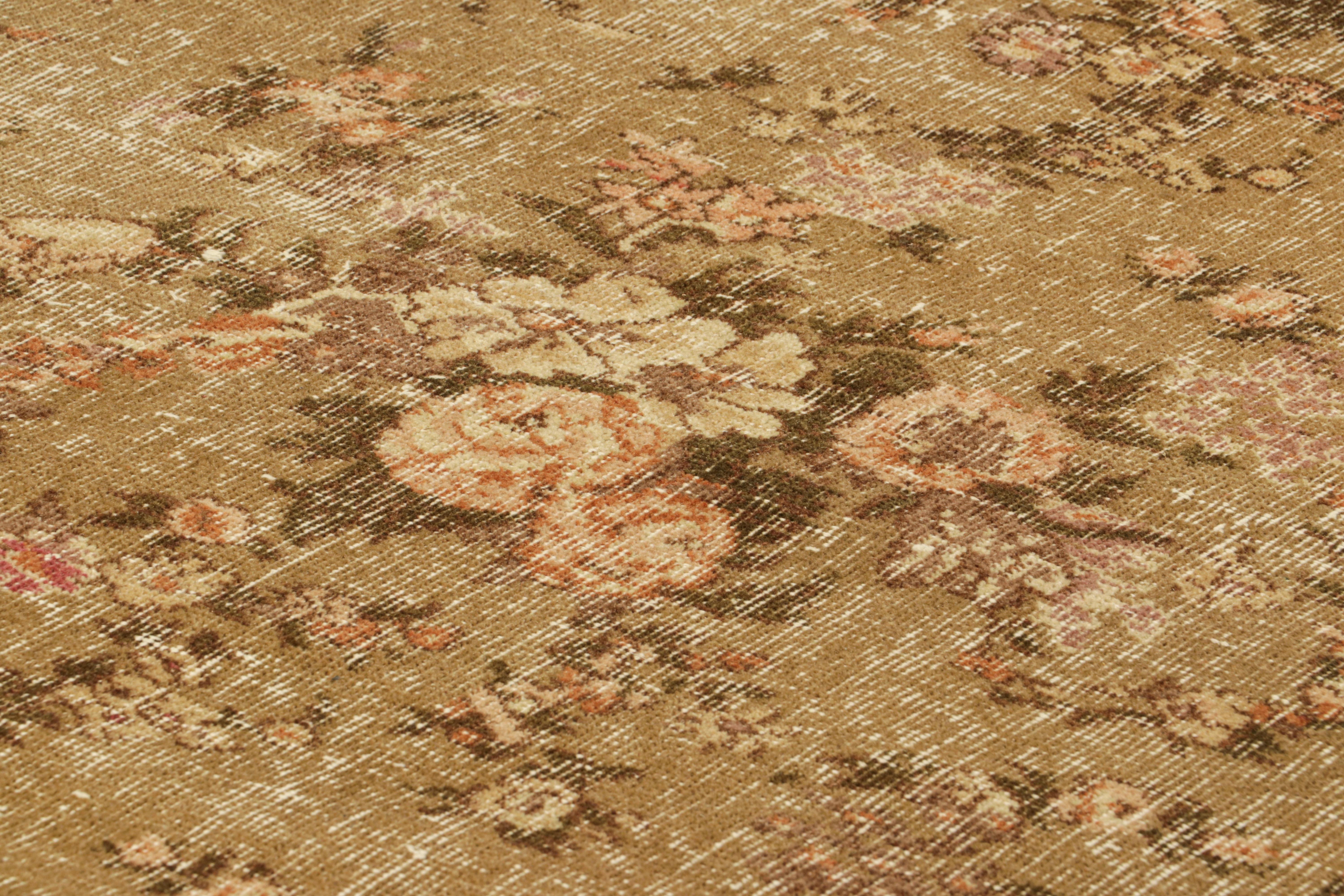 Hand-knotted in wool circa 1950-1960, this 4x6 vintage Karabagh rug from Russia is a very special piece, featuring a light and refreshing mid-century classical floral design. 

On The Design:

Rich brown underscores of florals with light pink,