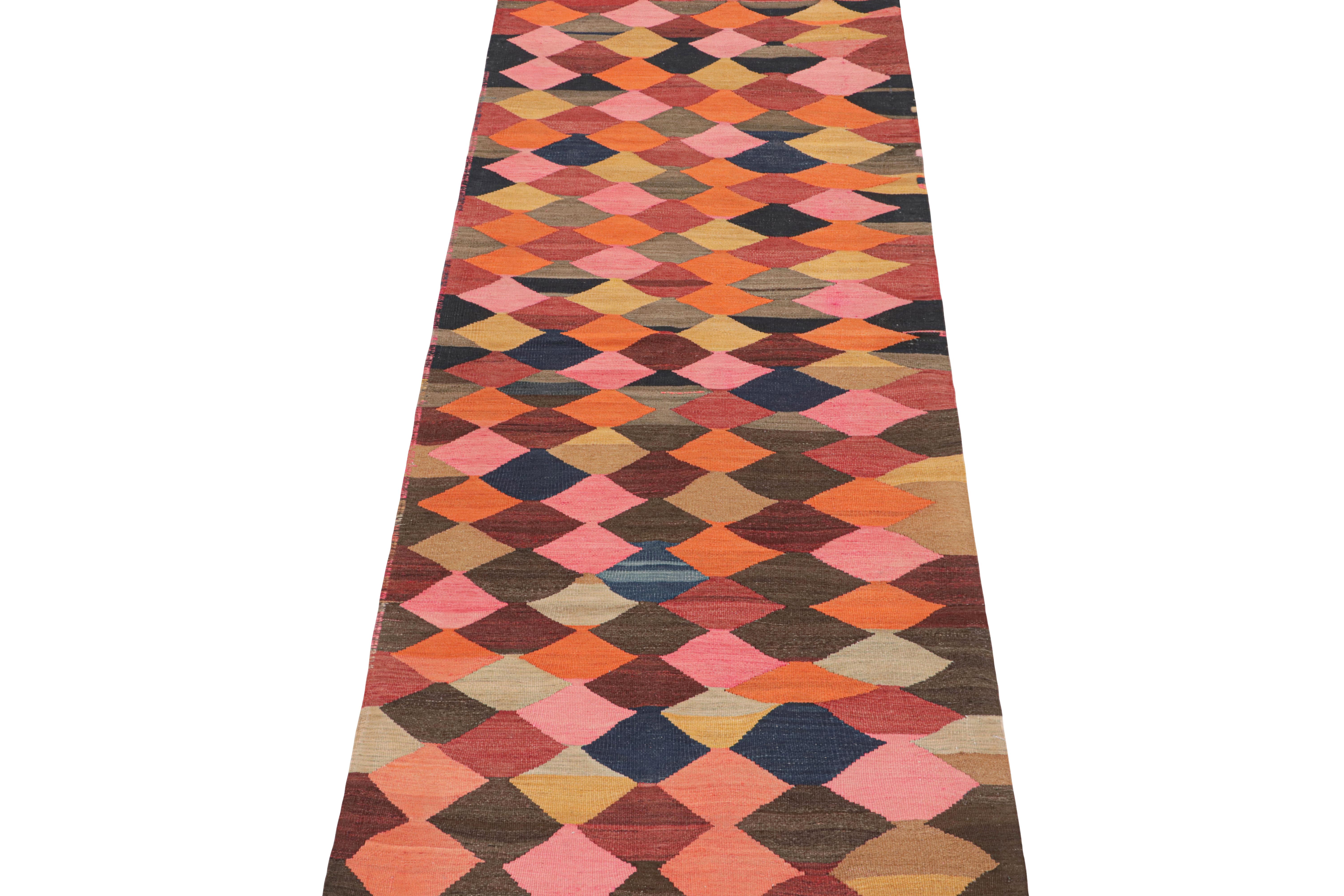 This vintage 4x10 Persian Kilim is believed to be a tribal runner of Karadagh—a mountainous region known for its craft. Handwoven in wool, it originates circa 1950-1960.

Design:

The bold design prefers geometric patterns in polychromatic