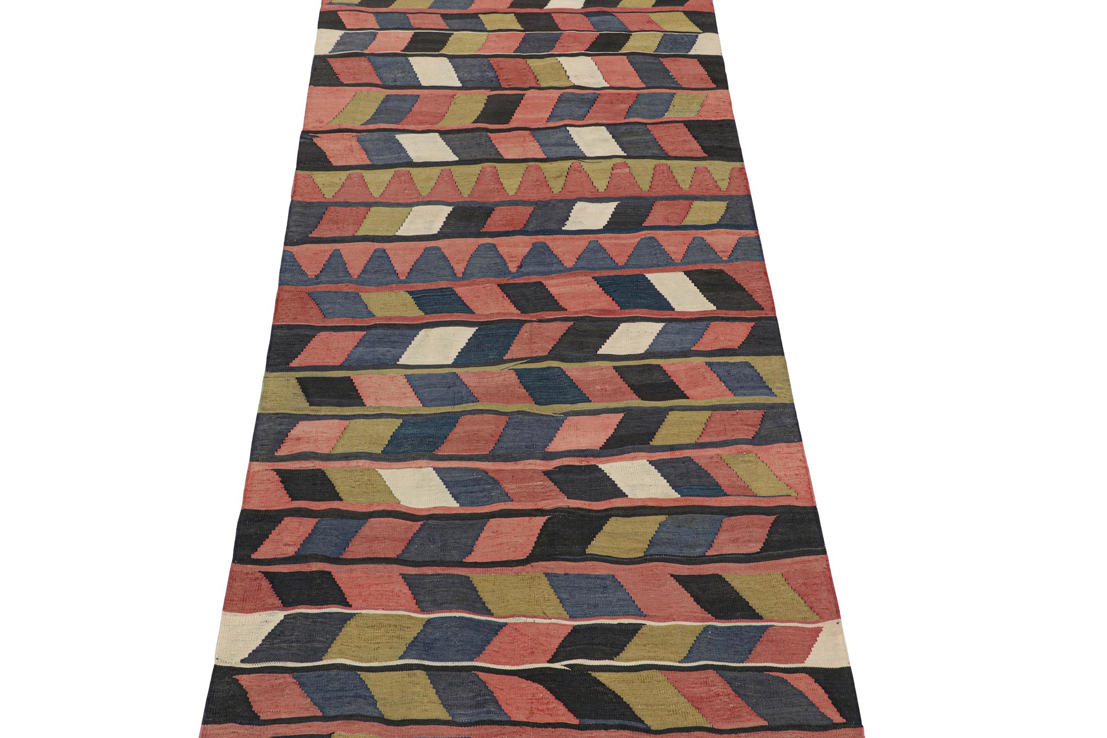This vintage 5x12 Persian Kilim is believed to be a tribal rug of Karadagh—a mountainous region known for its craft. Handwoven in wool, it originates circa 1950-1960.

Further on the Design:

The bold design prefers geometric patterns in