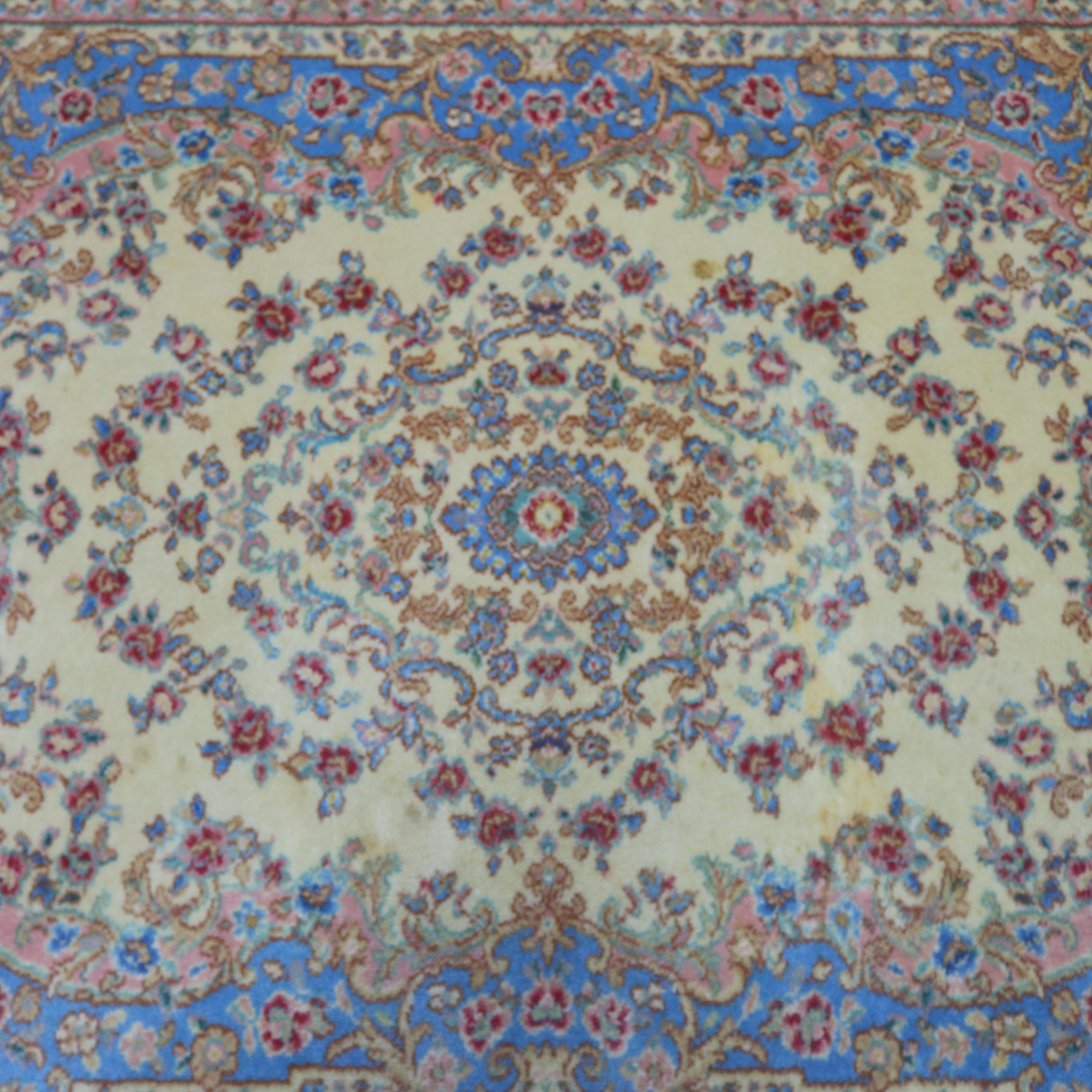 A vintage Karastan ivory Medallion #711 oriental rug offers blue, white and ink in pastel color palette with floral motif, circa 1950.

Measures - 4.3' x 6'.
