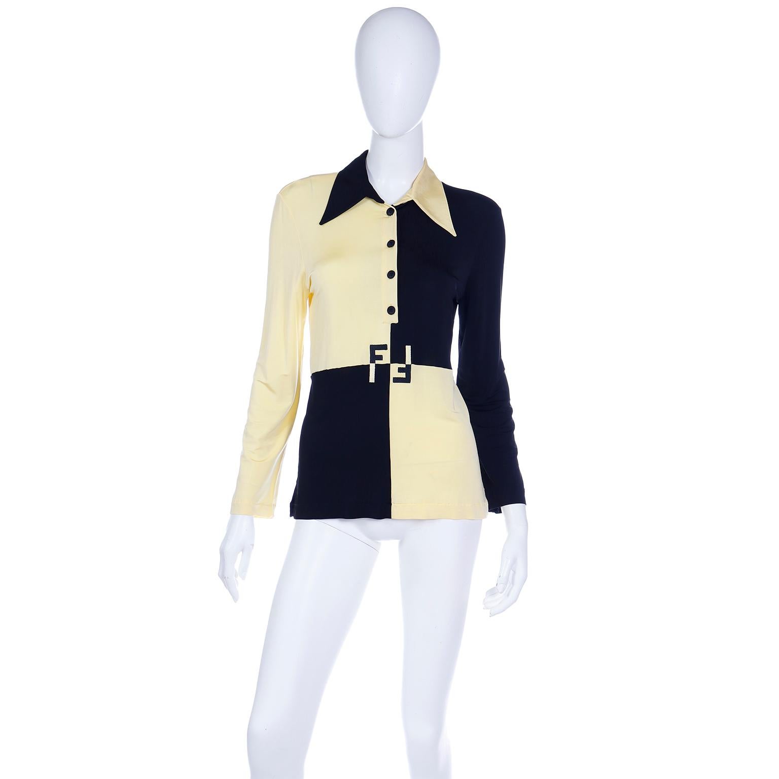This vintage 1990's Fendi shirt is a fantastic addition to any wardrobe that could use a pop of color! With the playful contrast of its butter yellow and black color block design, it is so uniquely elegant! The shirt features long sleeves, a pointed