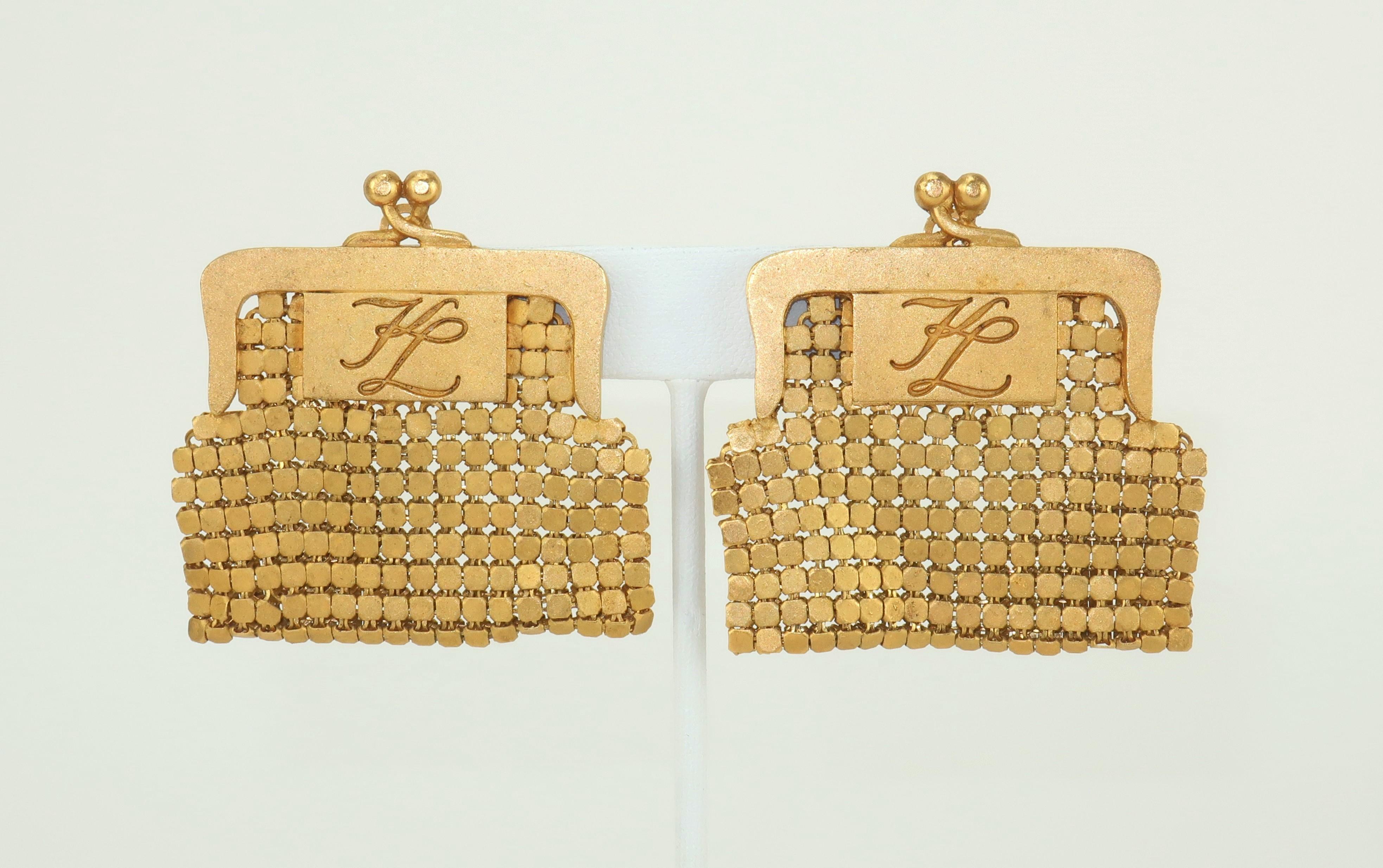 Fabulous Karl Lagerfeld clip on earrings fashioned to look like mesh coin purses … one for each ear!  The gold tone metal has a matte finish and bears the iconic ‘KL’ logo at the front and a smaller ‘KL’ hallmarked at the back.  Witty and