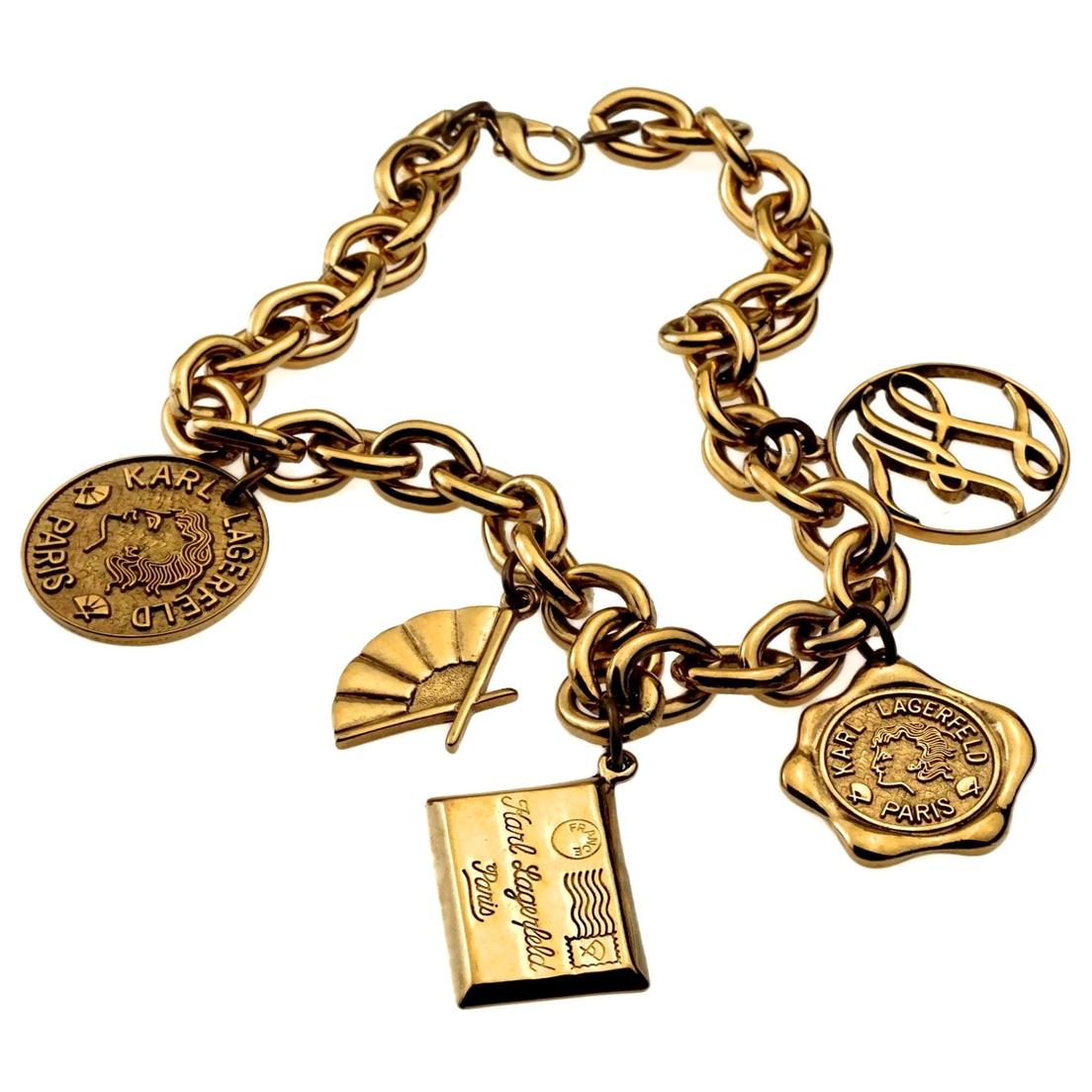 Chanel Vintage Gold Plated Chain Necklace with Six Iconic Charms For Sale  at 1stDibs