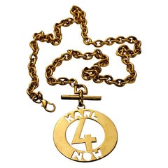 Vintage KARL LAGERFELD "Karl 4 Now" Cutout Medallion Necklace