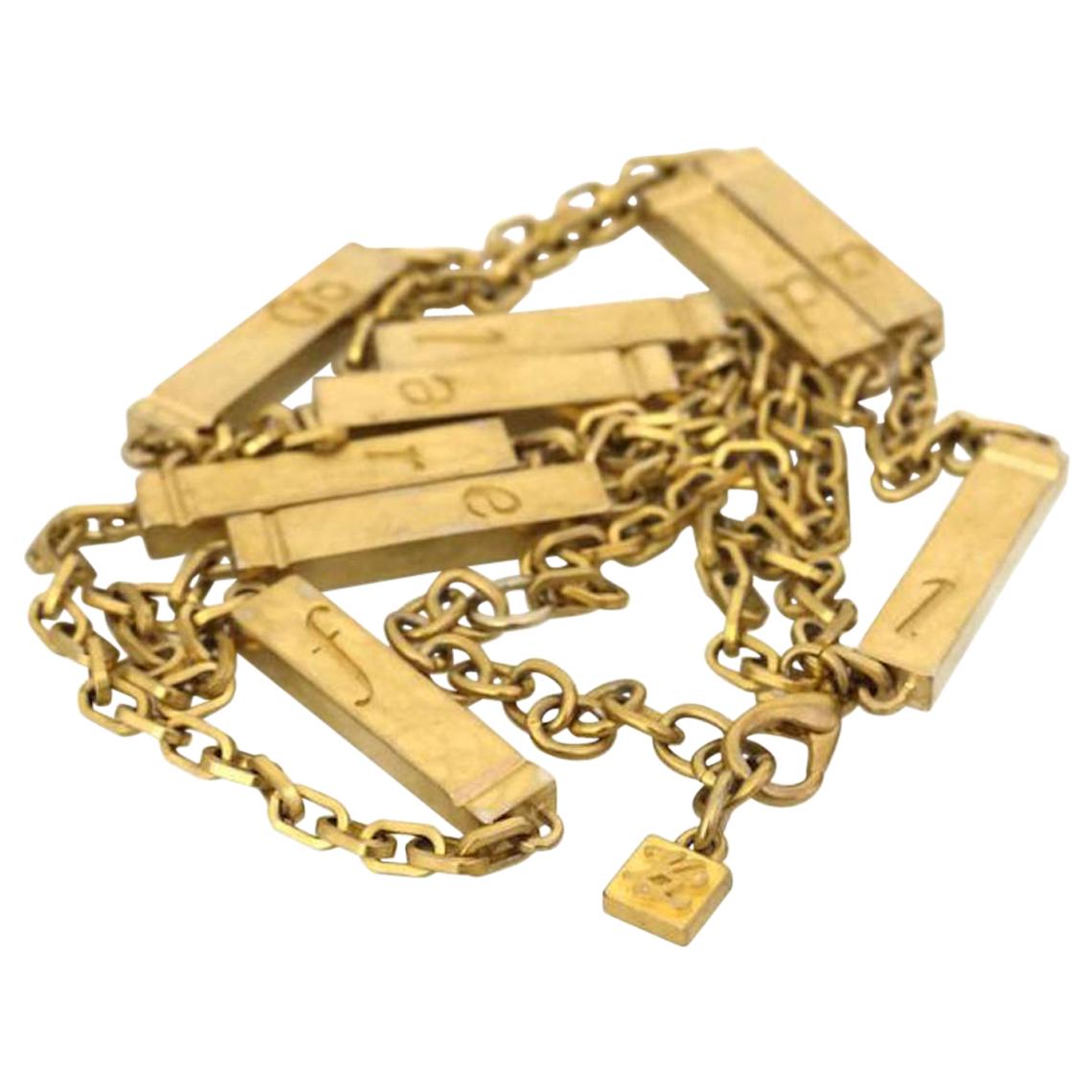 Vintage KARL LAGERFELD Letter Gold Bar Sautoir Necklace For Sale