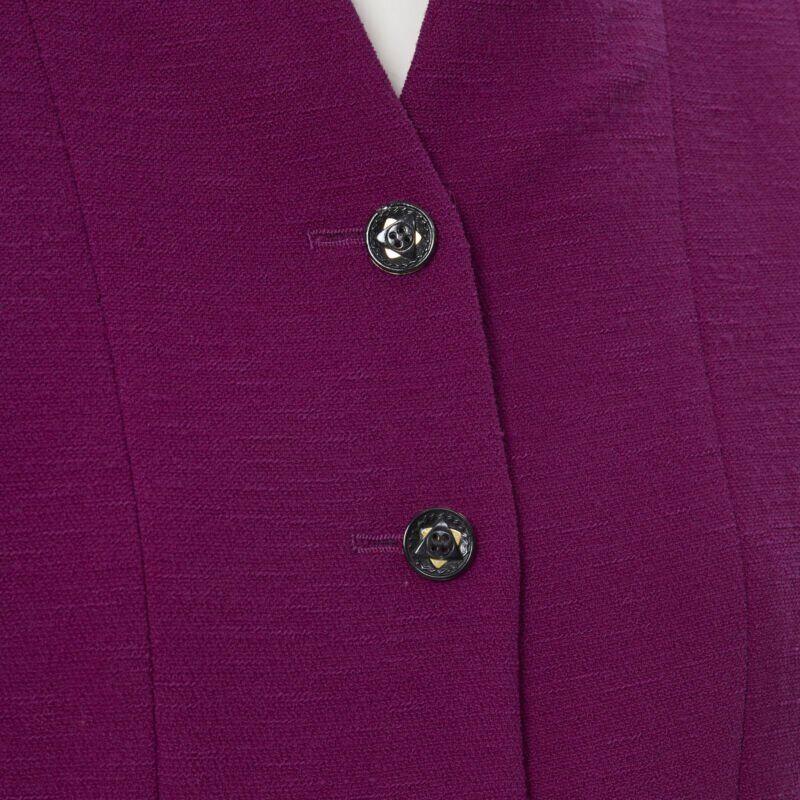vintage KARL LAGERFELD purple wool graphic button paneled blazer skirt suit FR36
Reference: GIYG/A00061
Brand: Karl Lagerfeld
Designer: Karl Lagerfeld
Material: Wool
Color: Purple
Pattern: Solid
Closure: Button
Extra Details: This blazer comes with