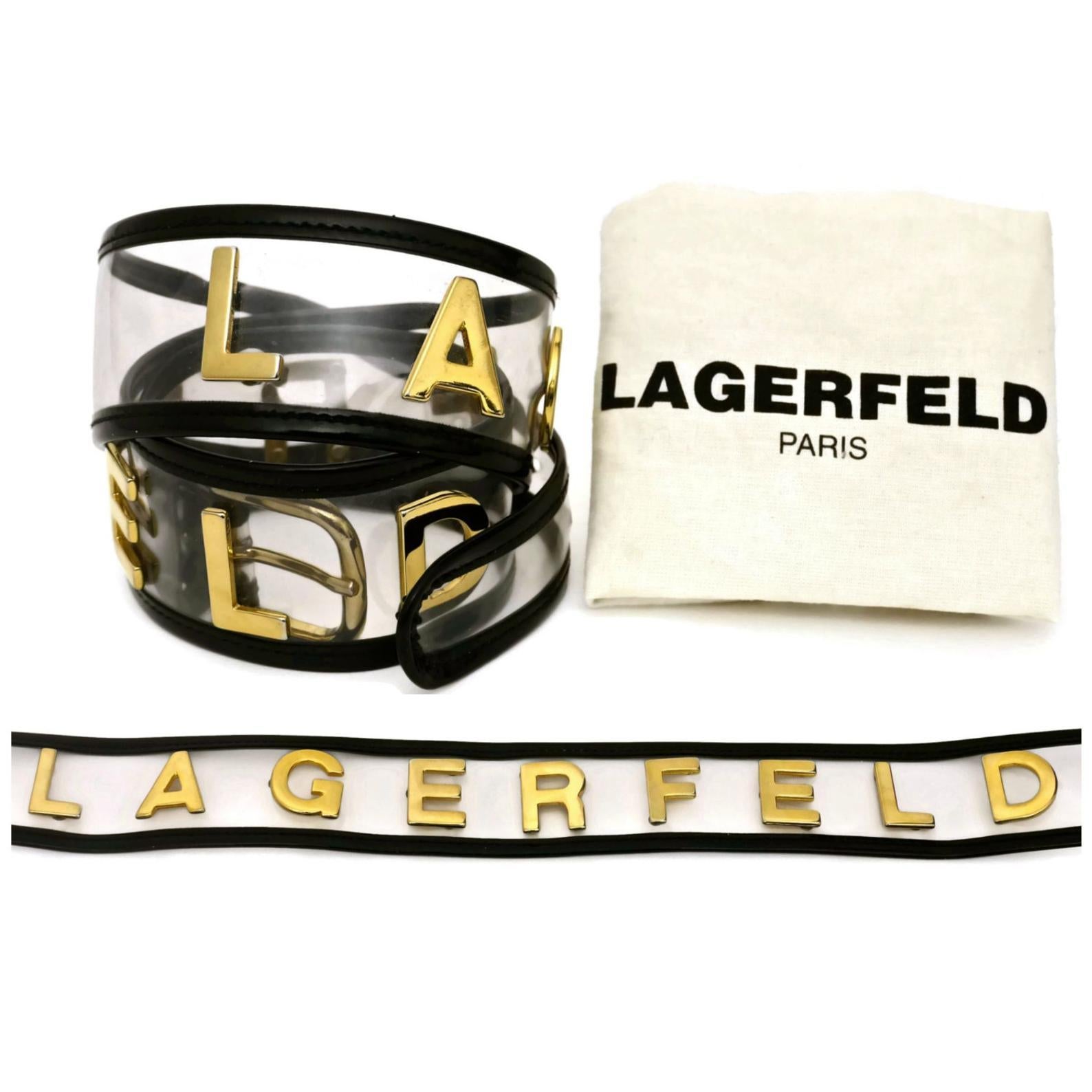 Vintage KARL LAGERFELD Transparent Gold Letter Belt

Measurements:
Height: 2 inches
Will fit waists: 29 4/8 inches to 32 inches

Features:
- 100% Authentic KARL LAGERFELD.
- Transparent vinyl and black patent leather trimming.
- Spelled LAGERFELD