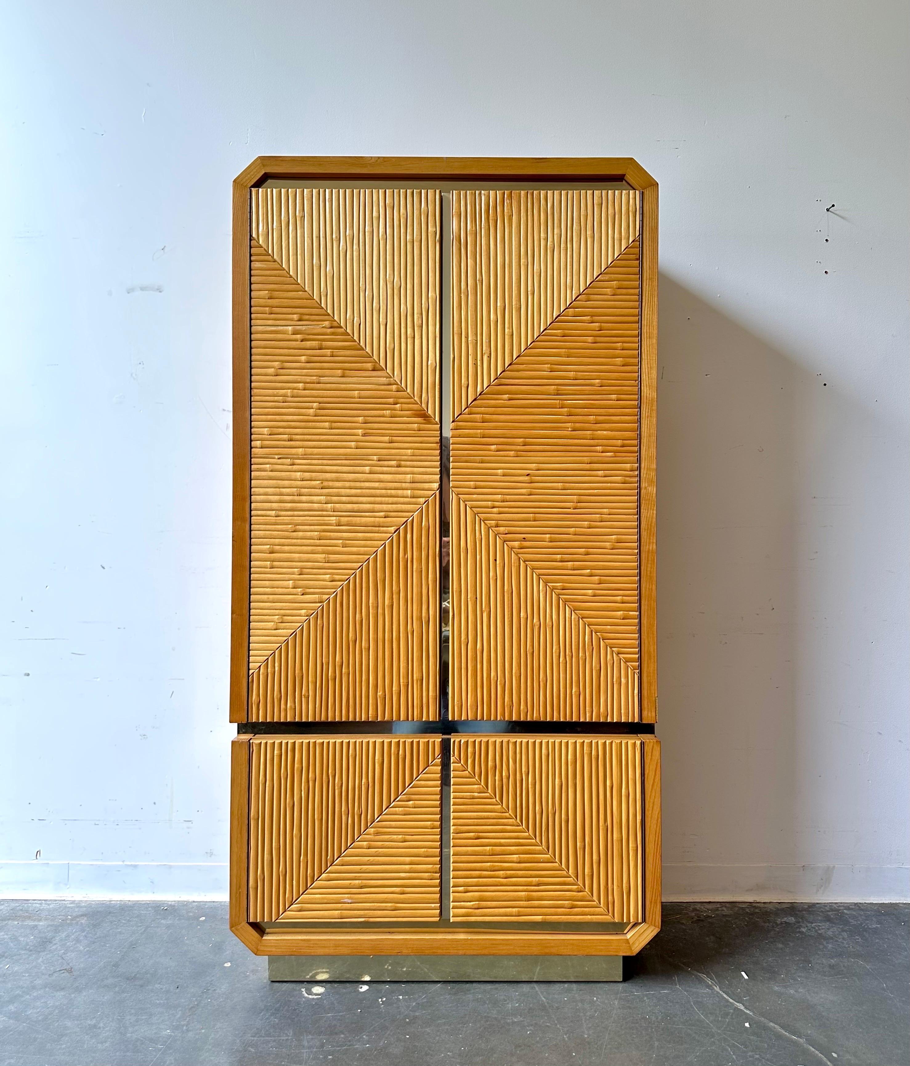 Post Modern Rattan and chrome armoire dresser

Fabolous piece in great condition.   
Four large drawers and adjustable shelves.

