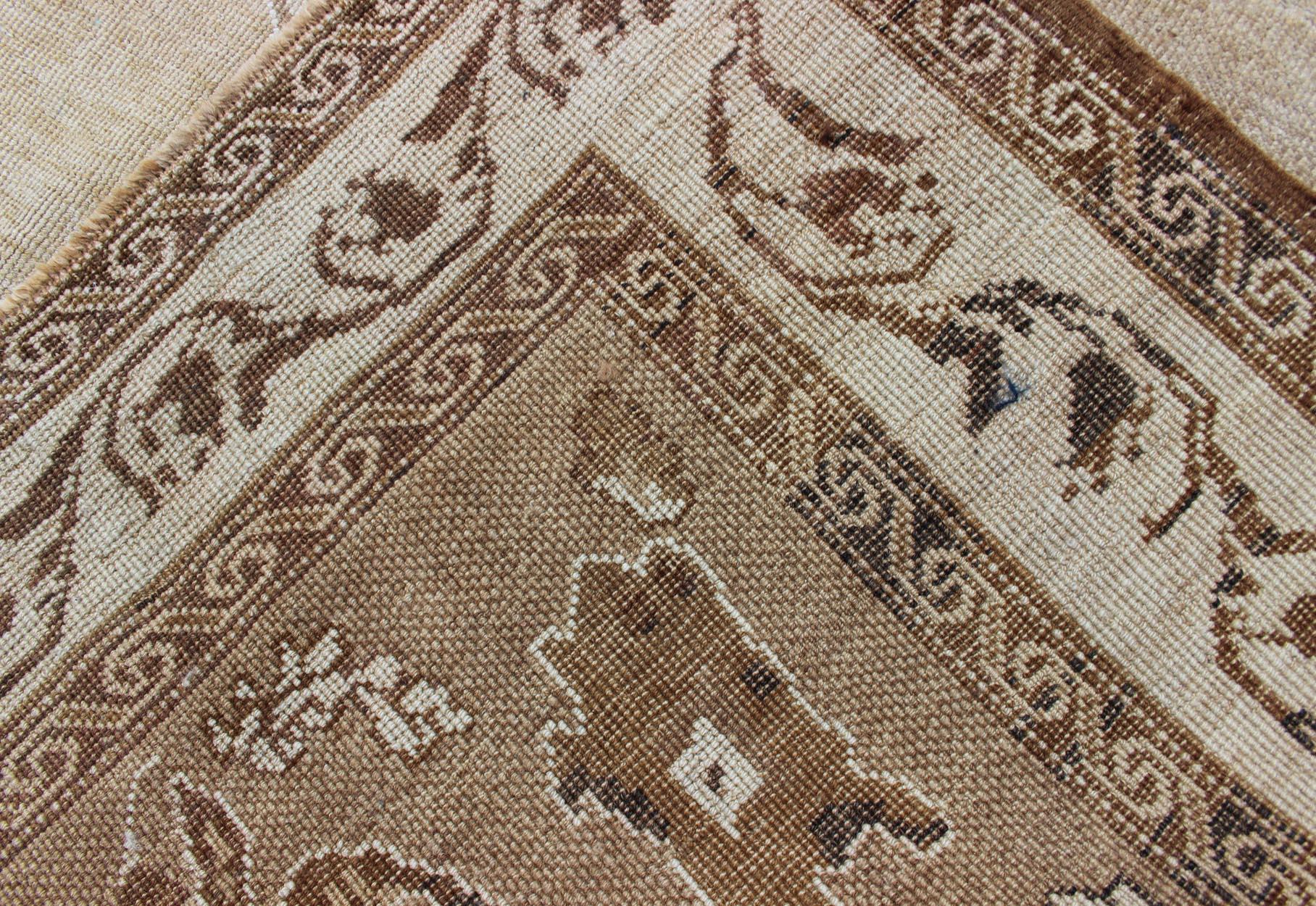Vintage Turkish Kars Gallery Rug With Earthy Color Palette and Ivory Border For Sale 7
