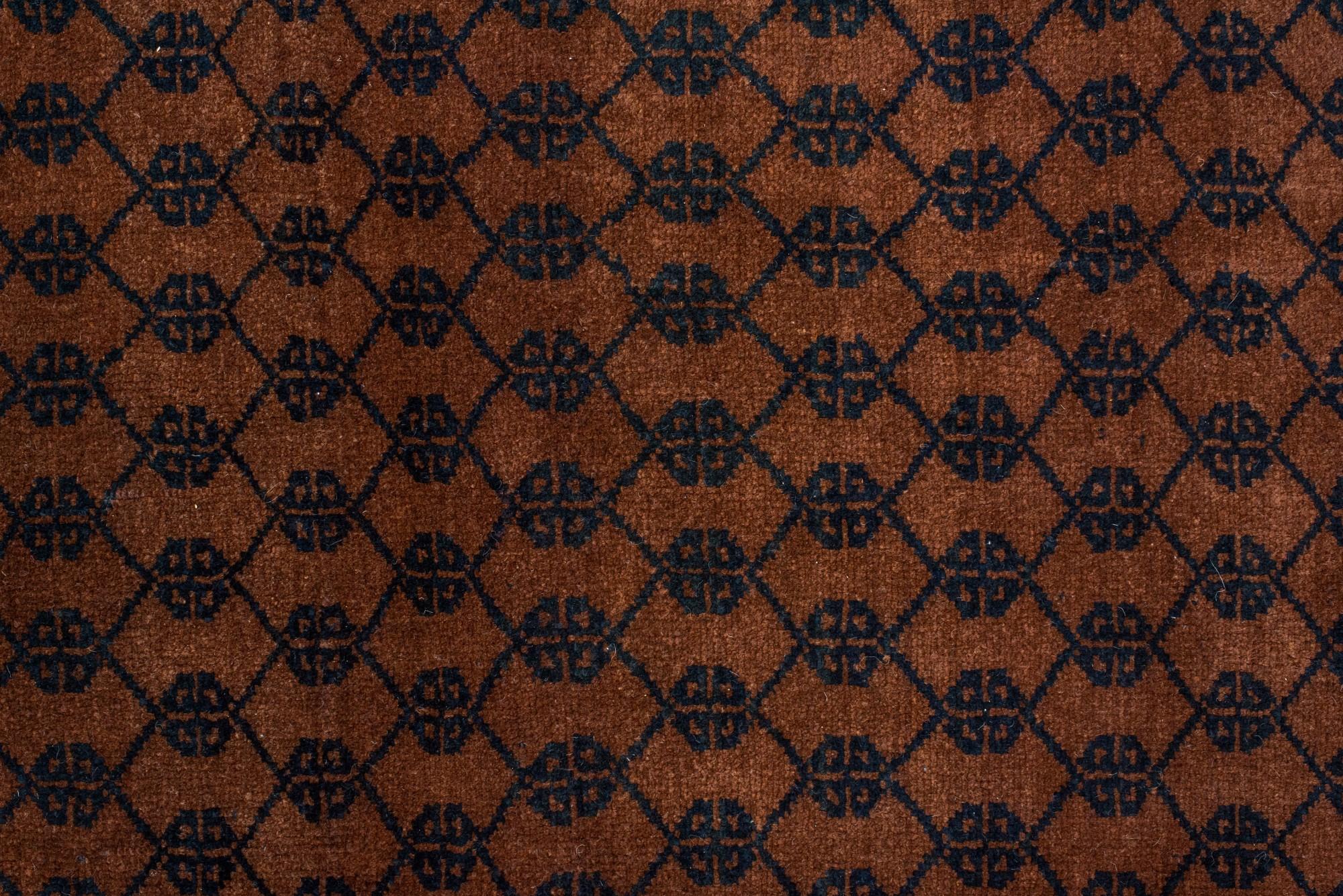 Hand-Knotted Vintage Kars Rug with Brown Field and Rosette Border For Sale