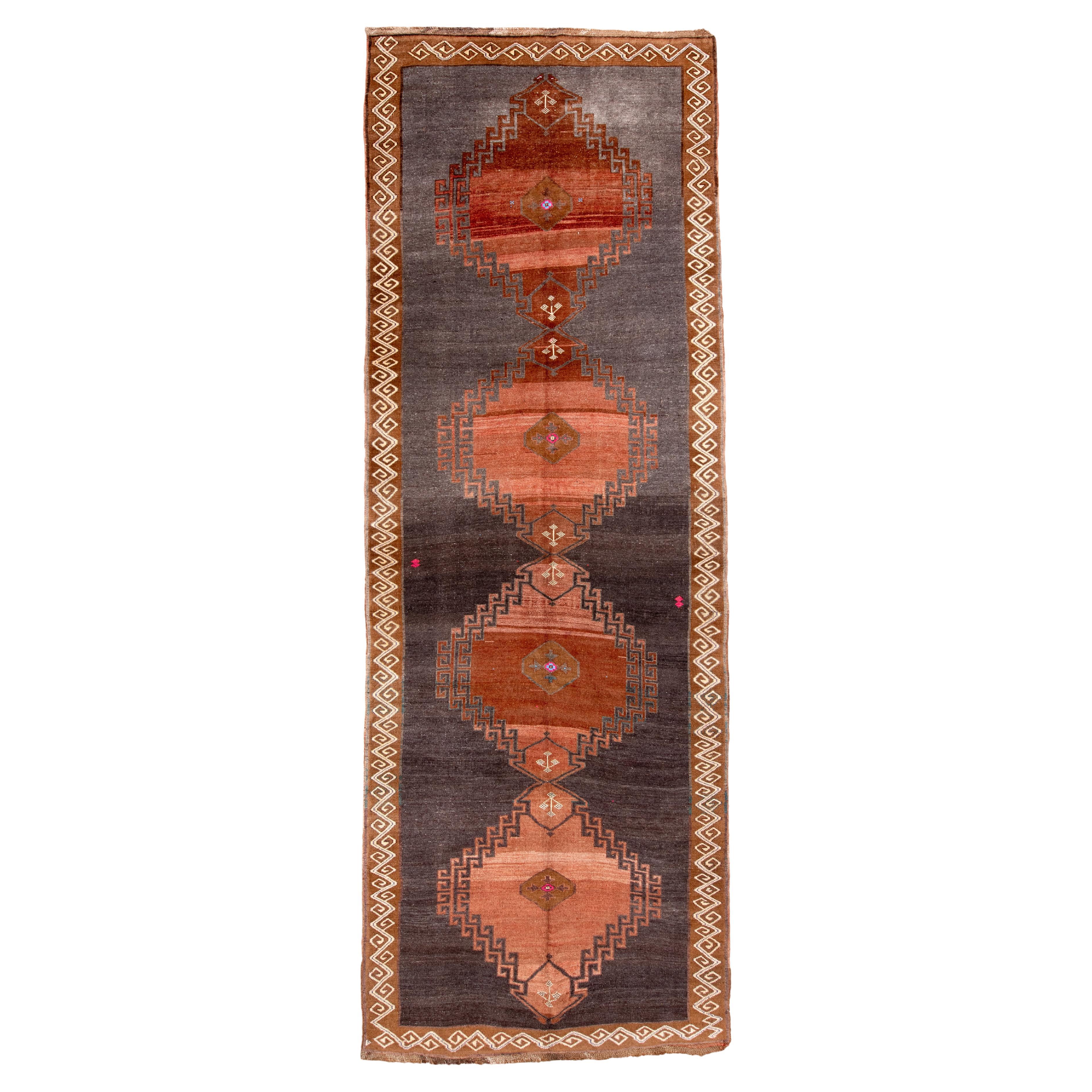 Vintage Kars Runner with Bold Geometric Medallions in Charcoal 
Terracotta For Sale