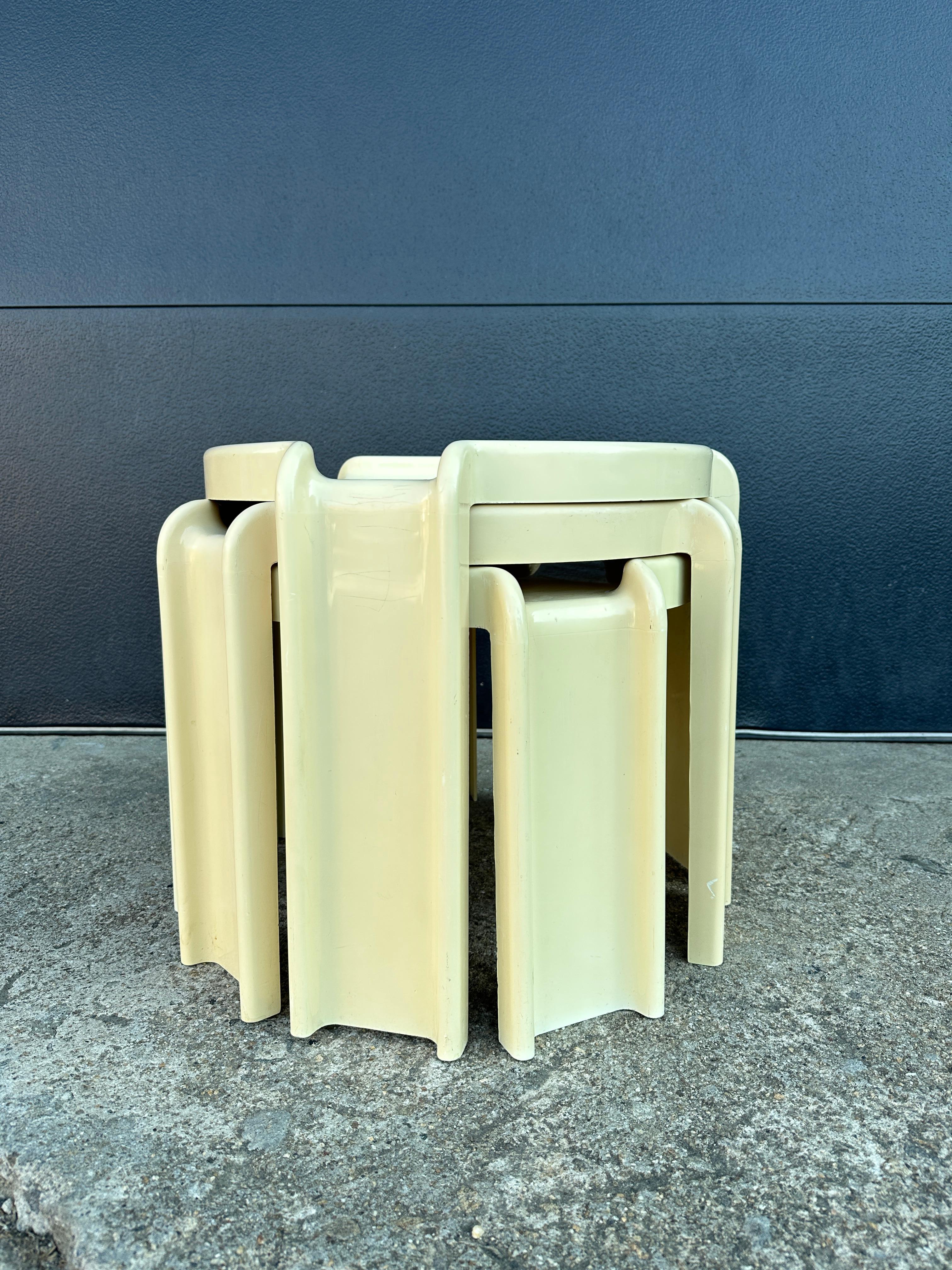 Vintage nesting tables designed by Giotto Stoppino for Kartell, Italy. Three tables in total manufactured in molded ivory plastic.

Large 16.70 Diameter x 16”H

Medium 16.70 Diameter x 14.5”H

Small 16.70 Diameter x 13”H.
