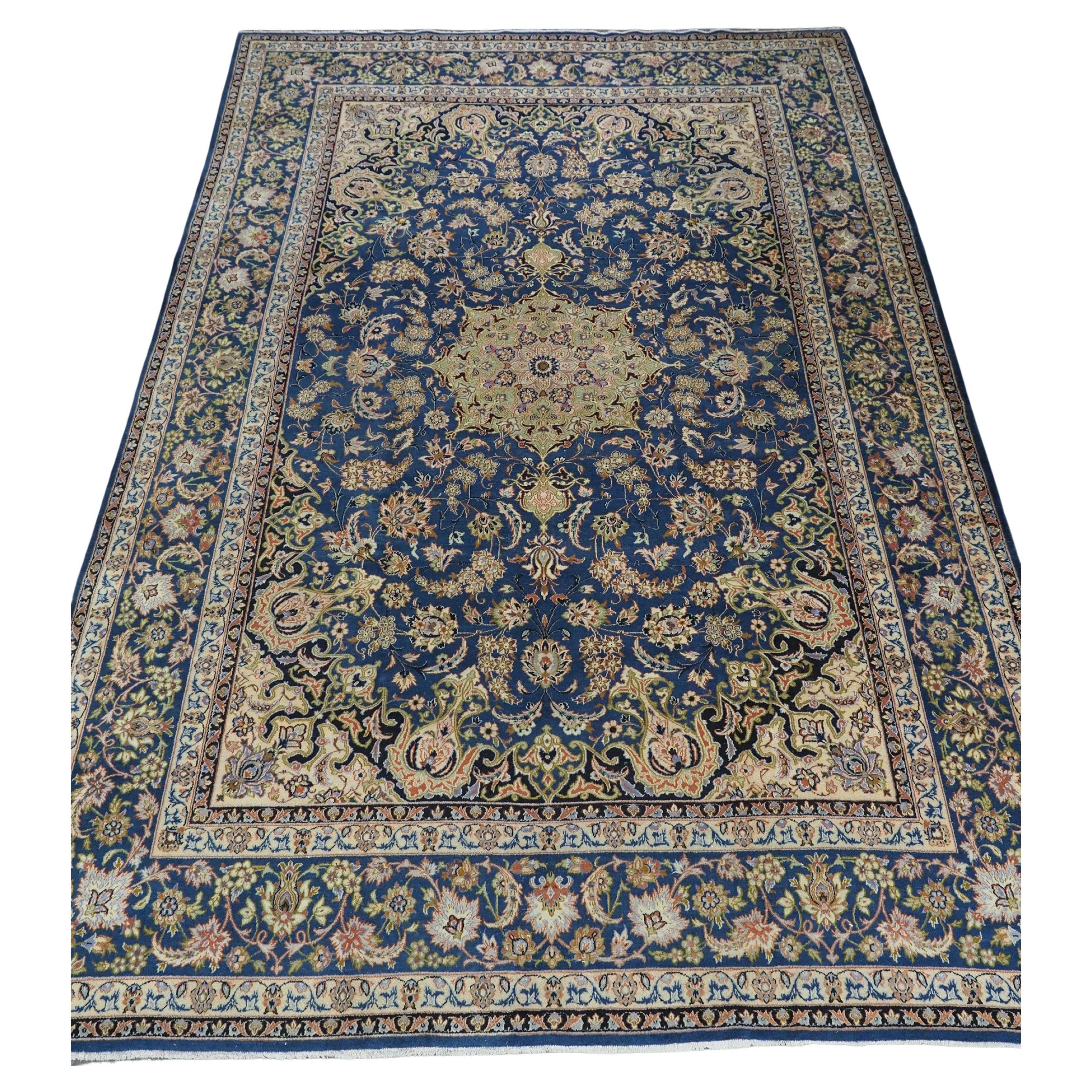 Vintage  Kashan carpet of traditional  design in a large room size.