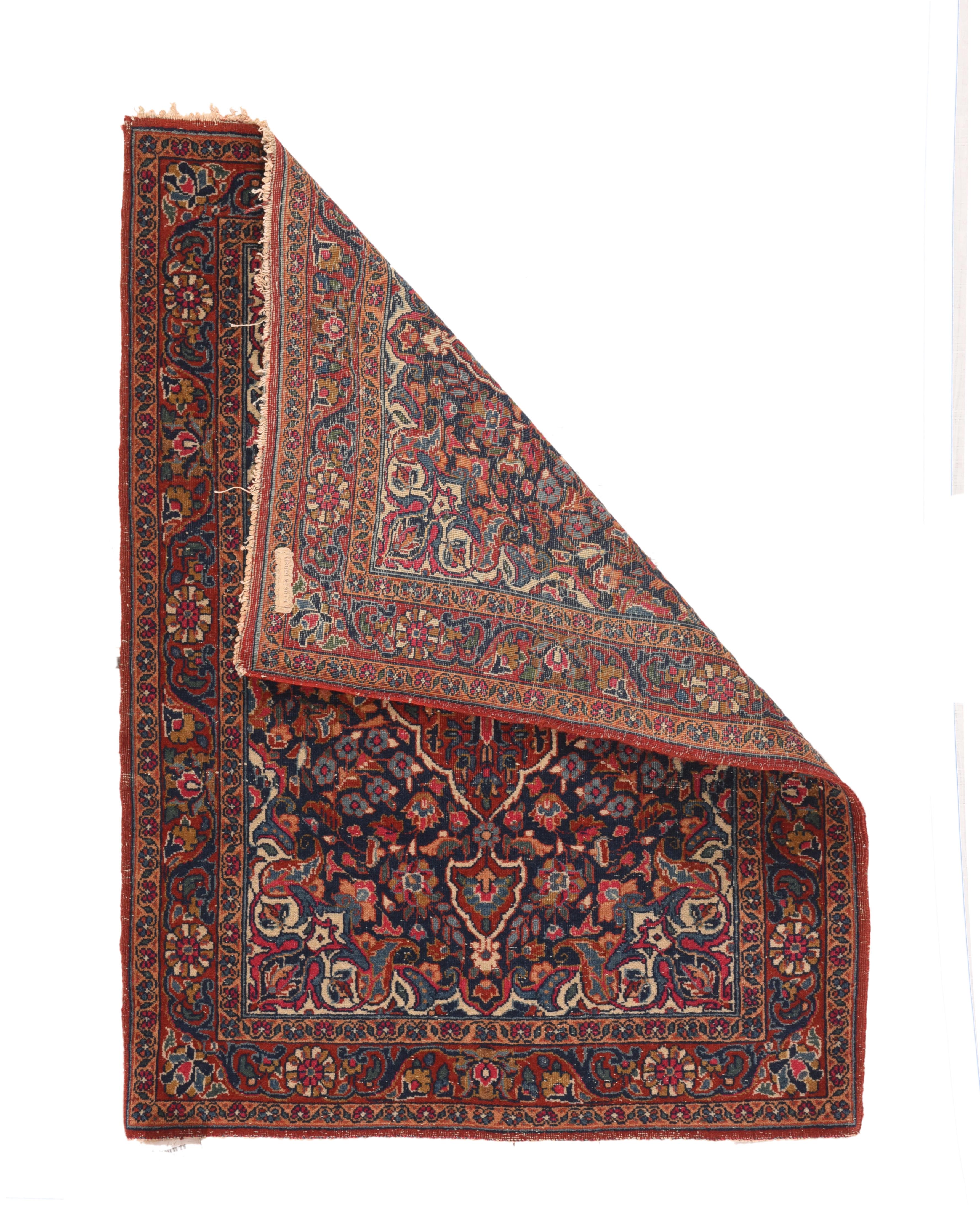 Vintage Kashan Rug 2'2'' x 2'11''. This central Persian urban ruglet shows a navy flower-filled field, a pendanted red cusped elongated medallion, and cream corners accented with red turtle-type diagonal palmettes. Red border with rosettes,