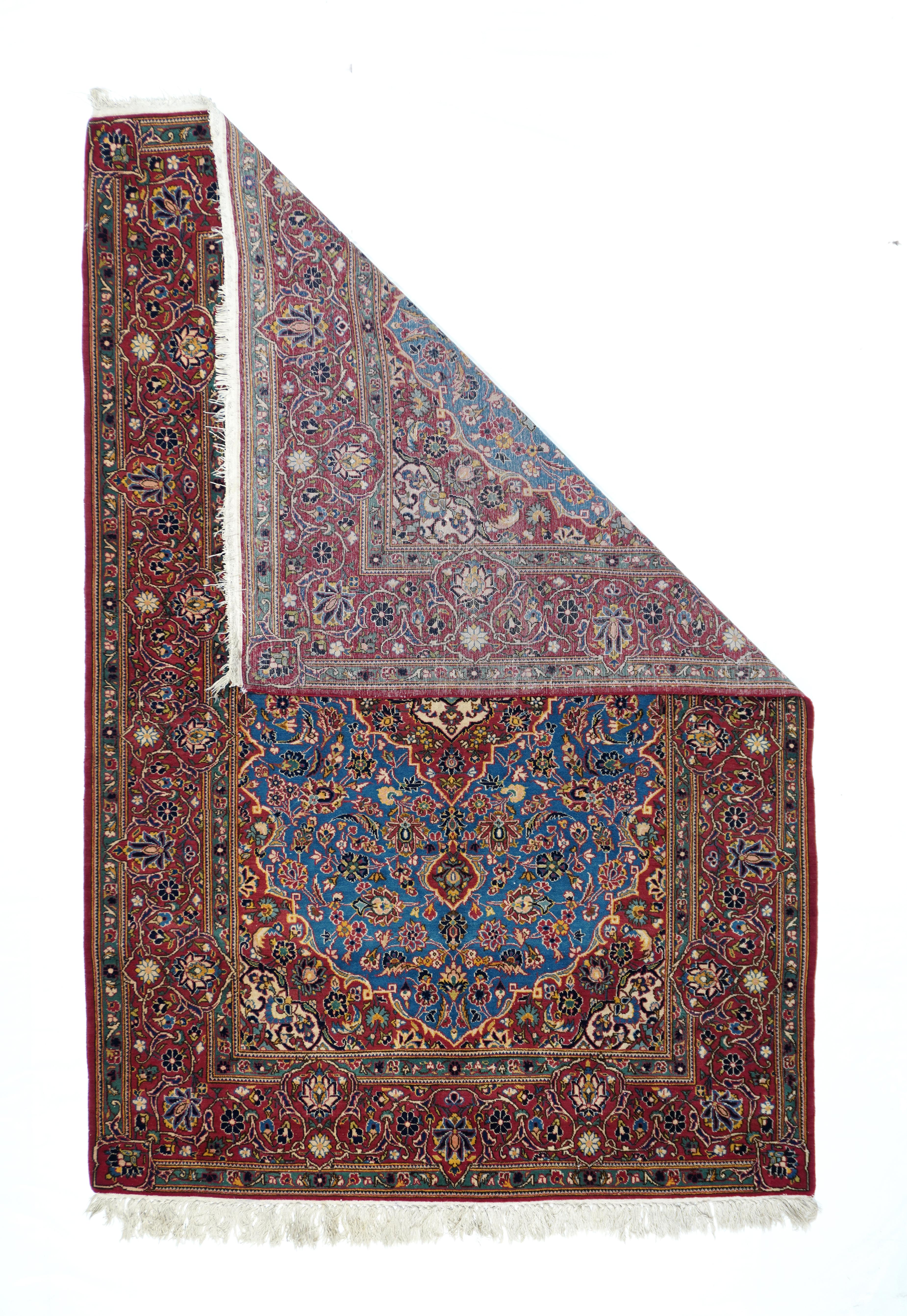 Vintage Kashan rug. Measures: 4.7'' x 6.10''. The attractive almost light blue field displays a pendanted red medallion and ivory sub-medallion with eight radiating arabesque palmettes, repeated on a larger overall scale in the extended corners. The