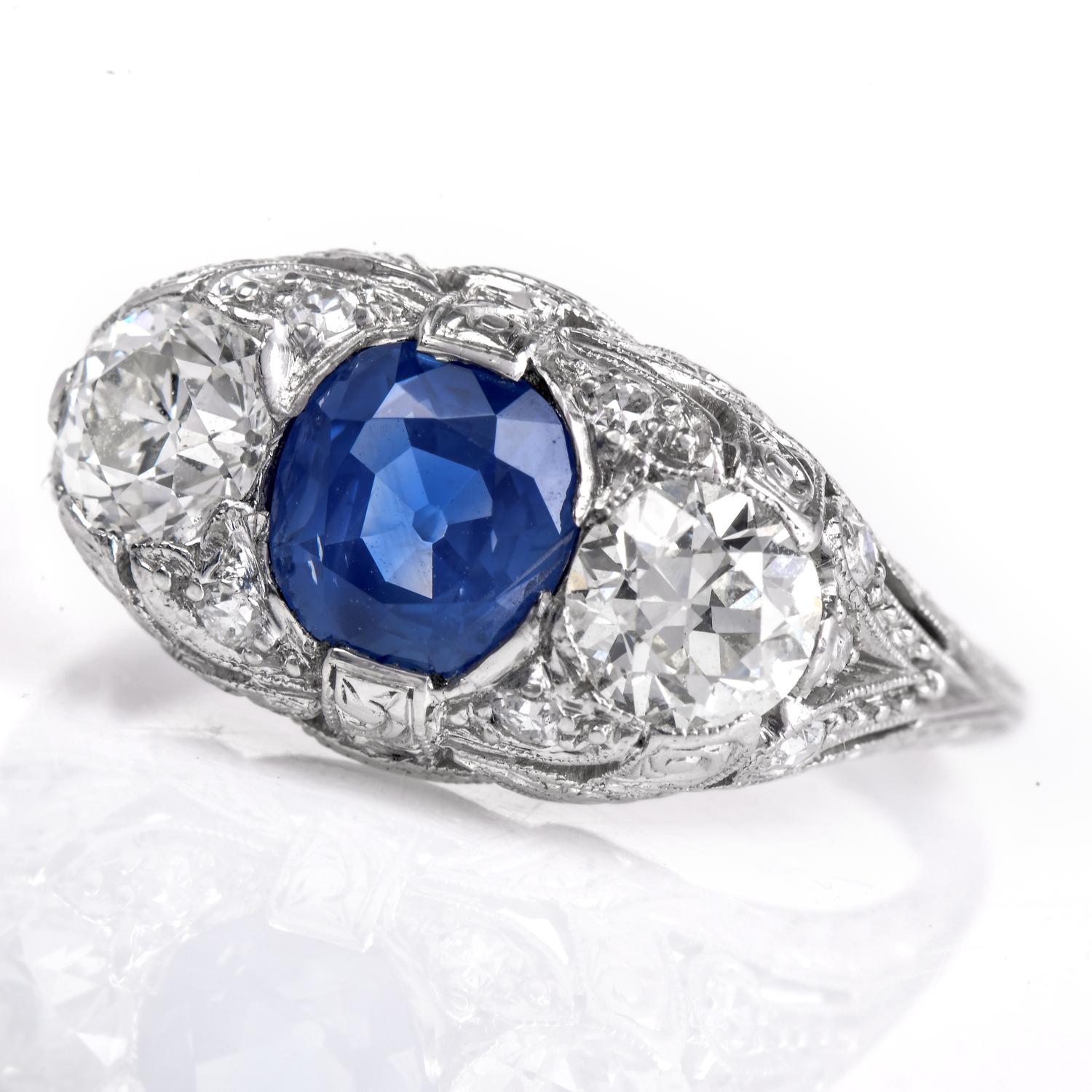 This Rare Antique Natural No heat Kashmir Sapphire Diamond Three Stone Engagement Ring boasts beauty with an approximate total weight of 5.8 grams. 

This vintage three-stone sapphire diamond ring is crafted in solid Platinum, Featuring a 1.69 Carat