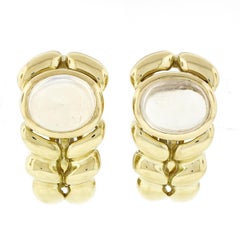 Pendientes vintage Kaufmann de Suisse de oro de 18 quilates con piedra de luna y clip ancho trenzado