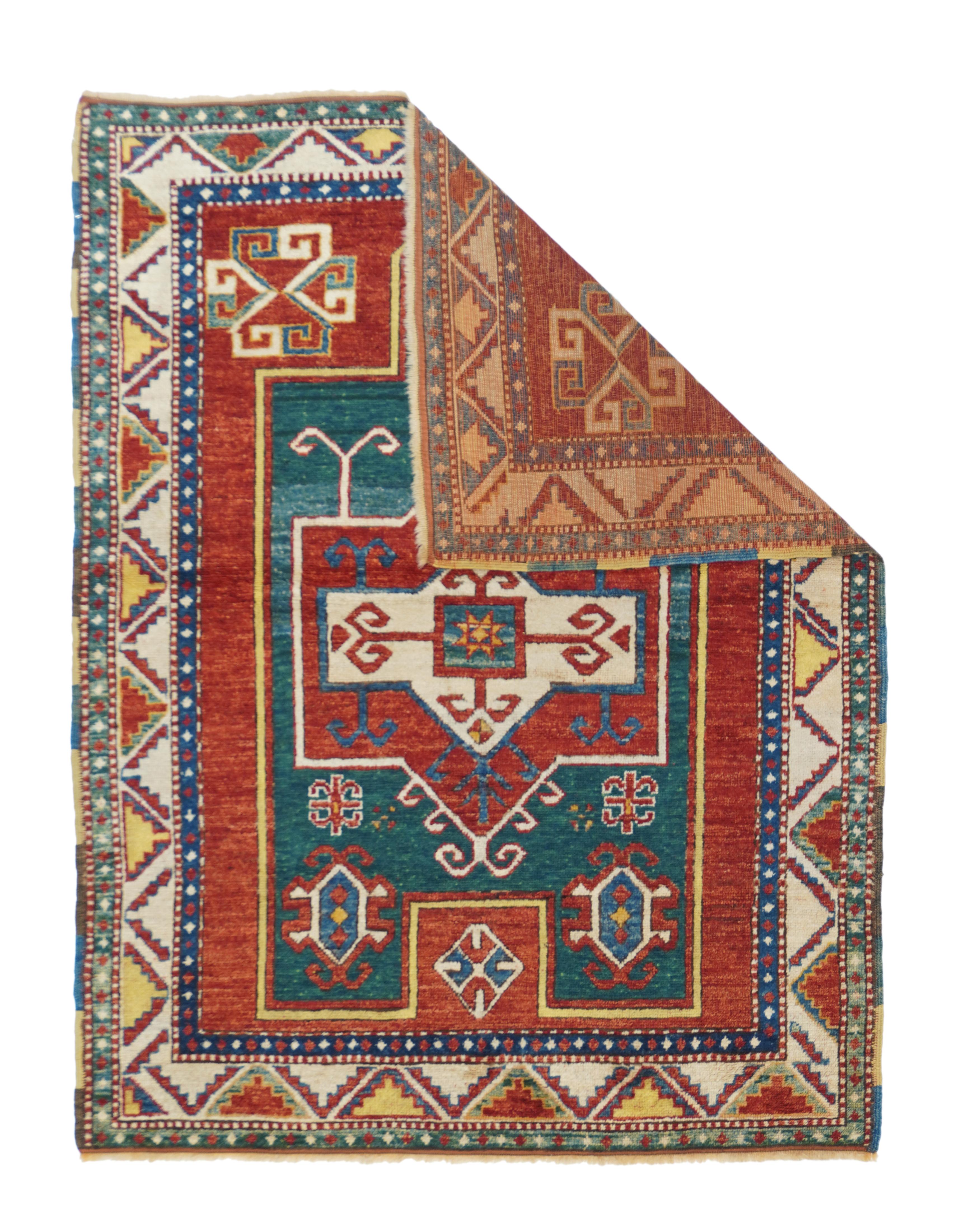Vintage Kazak Fachralo Rug 4'0'' x 5'2''. This is a very classic Fachralo type of southwest Caucasian Kazak prayer rug with a relatively narrow natural dye palette including: madder red for the field; abrashed denim blue for the floating niche area;