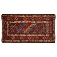 Vintage Kazak Rug, Handwoven with Tribal and Floral Pattern and Deep Dyes