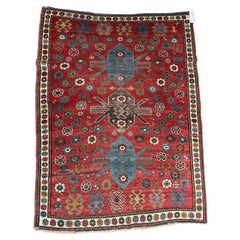 Vintage Kazak Rug With Floral Rosettes and Tribal Medallions – 5'7" X 4'2"