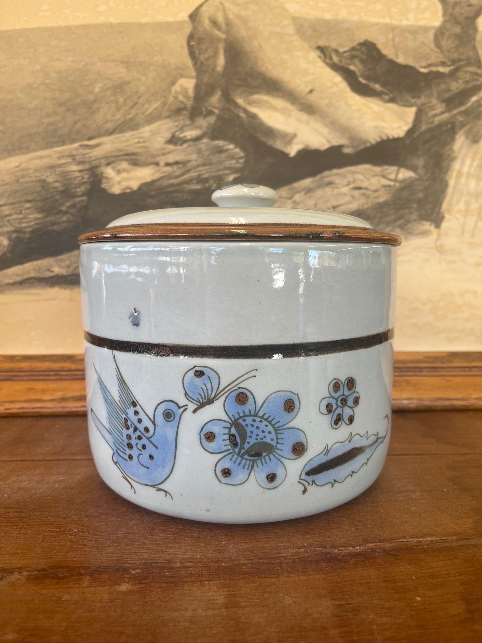 This Pot Features a Blue Bird and Floral Motif.  Makers Mark on the Bottom States “ ElbPalomarr Buen Gustp Mexico” Vintage Condition Consistent with Age.

Dimensions. 7 1/2 Diameter; 51/2 H