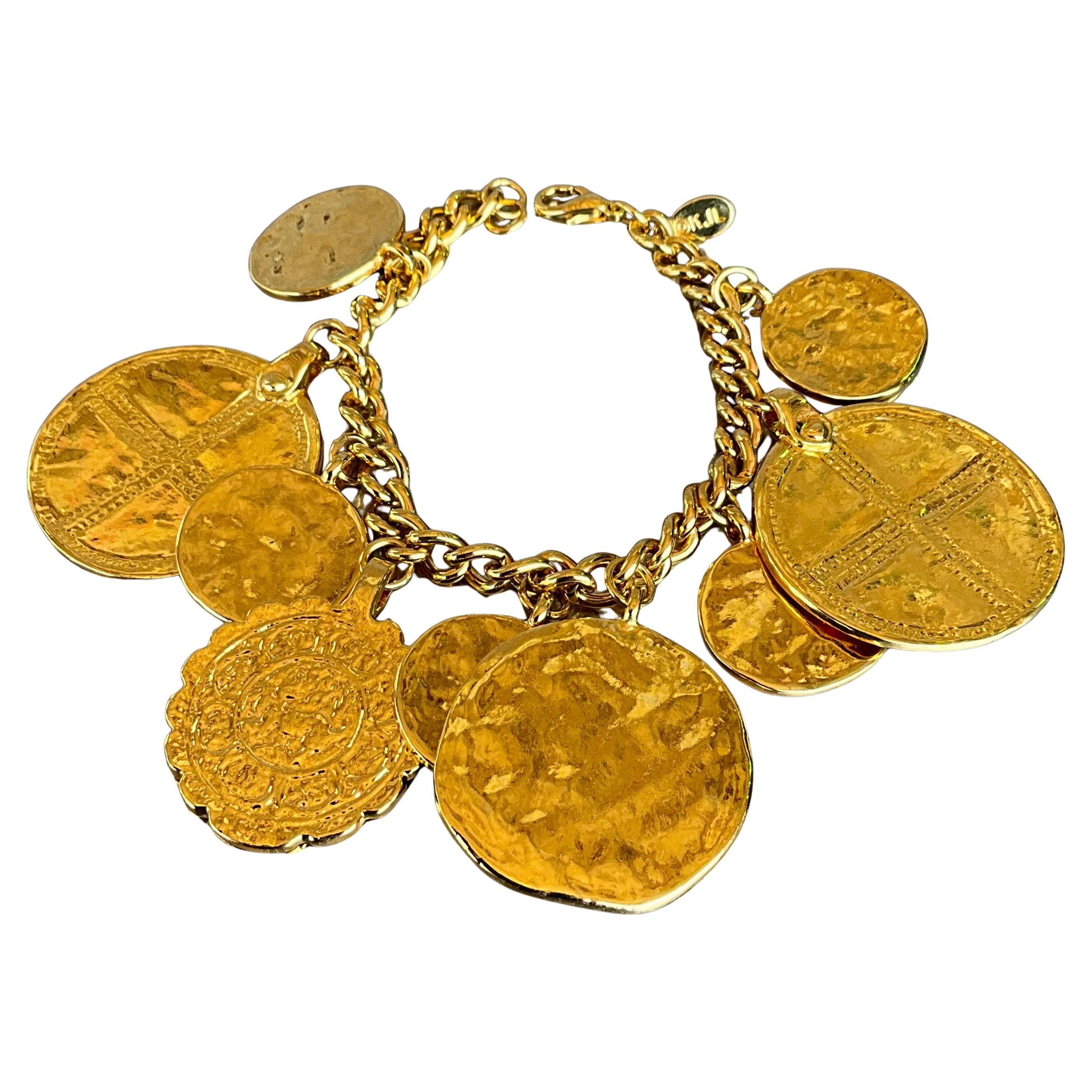 Vintage Kenneth Jay Lane Acapulco Gold tone Medallion Charm Bracelet For Sale