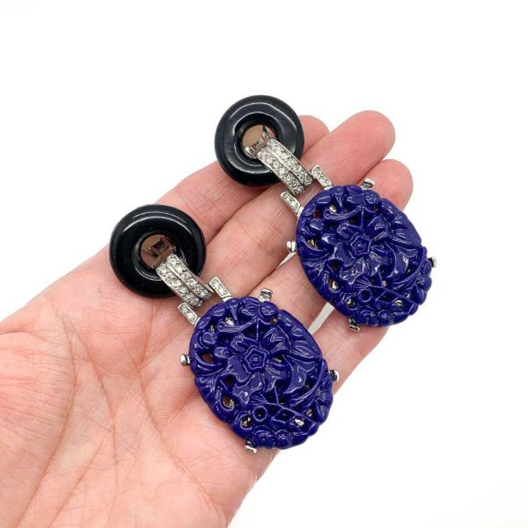 Spectacular Art Deco Revival Vintage Kenneth Jay Lane Deco Earrings. Featuring rhodium plated metal and faux carved lapis panels and onyx circles in resin. Signed. In very good vintage condition. Large statement earrings approx. 7cm. A super style