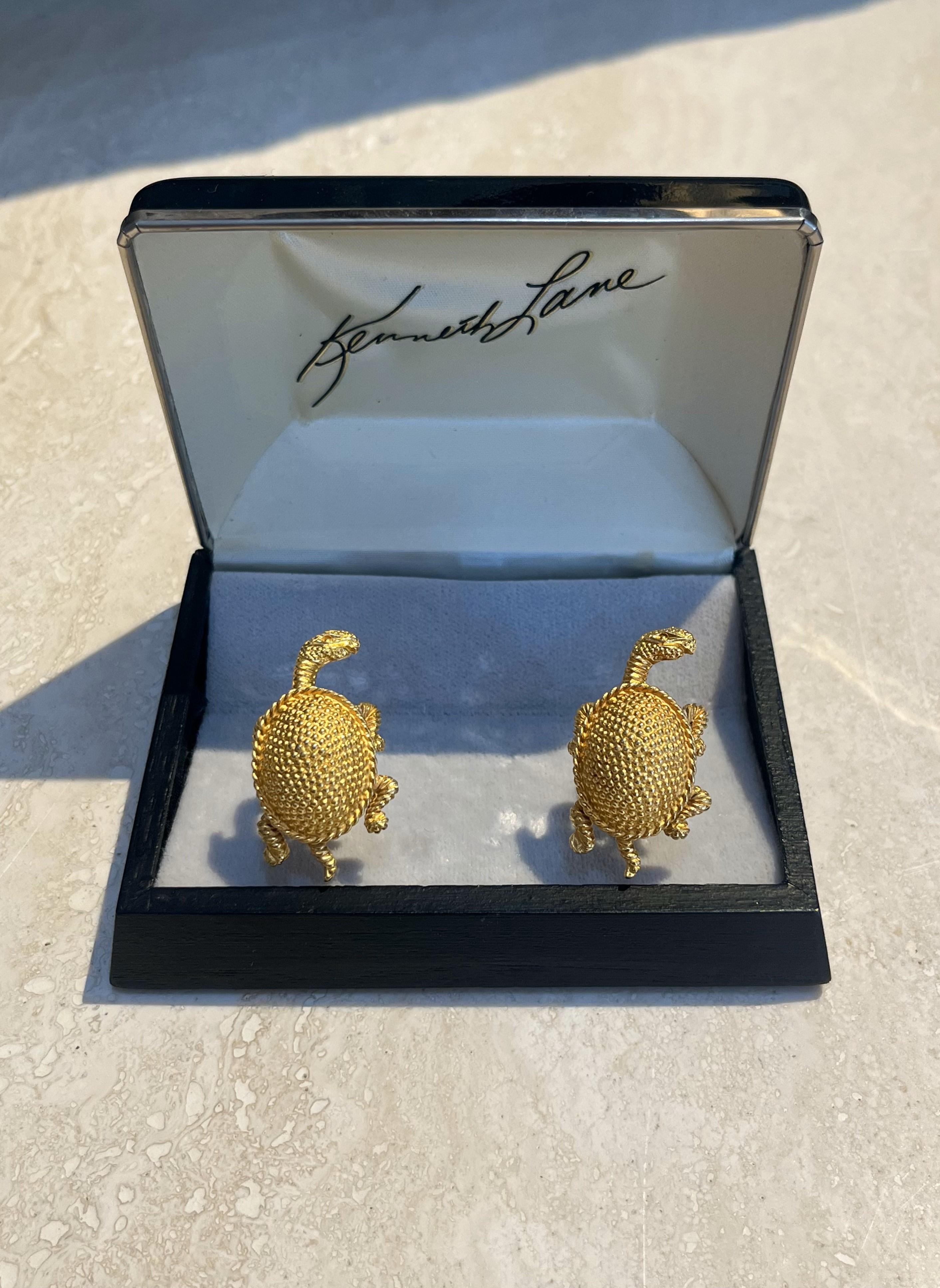 Vintage Kenneth Jay Lane Turtle Cuff Links are a delightful and whimsical piece of jewelry, showcasing the bold and artistic design that Kenneth Jay Lane is known for. 

As a vintage piece, these Kenneth Jay Lane cufflinks would likely hail from the
