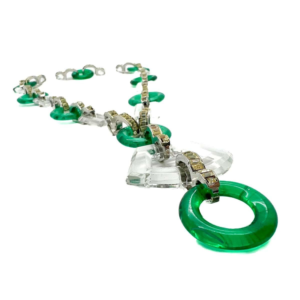 A Vintage Kenneth Lane Art Deco Lariat. Originating rom Lane's stand out and highly revered Art Deco collection. Art Deco being one of Lane's favourite periods of design. This eternally elegant necklace cleverly emulates a jade and rock crystal
