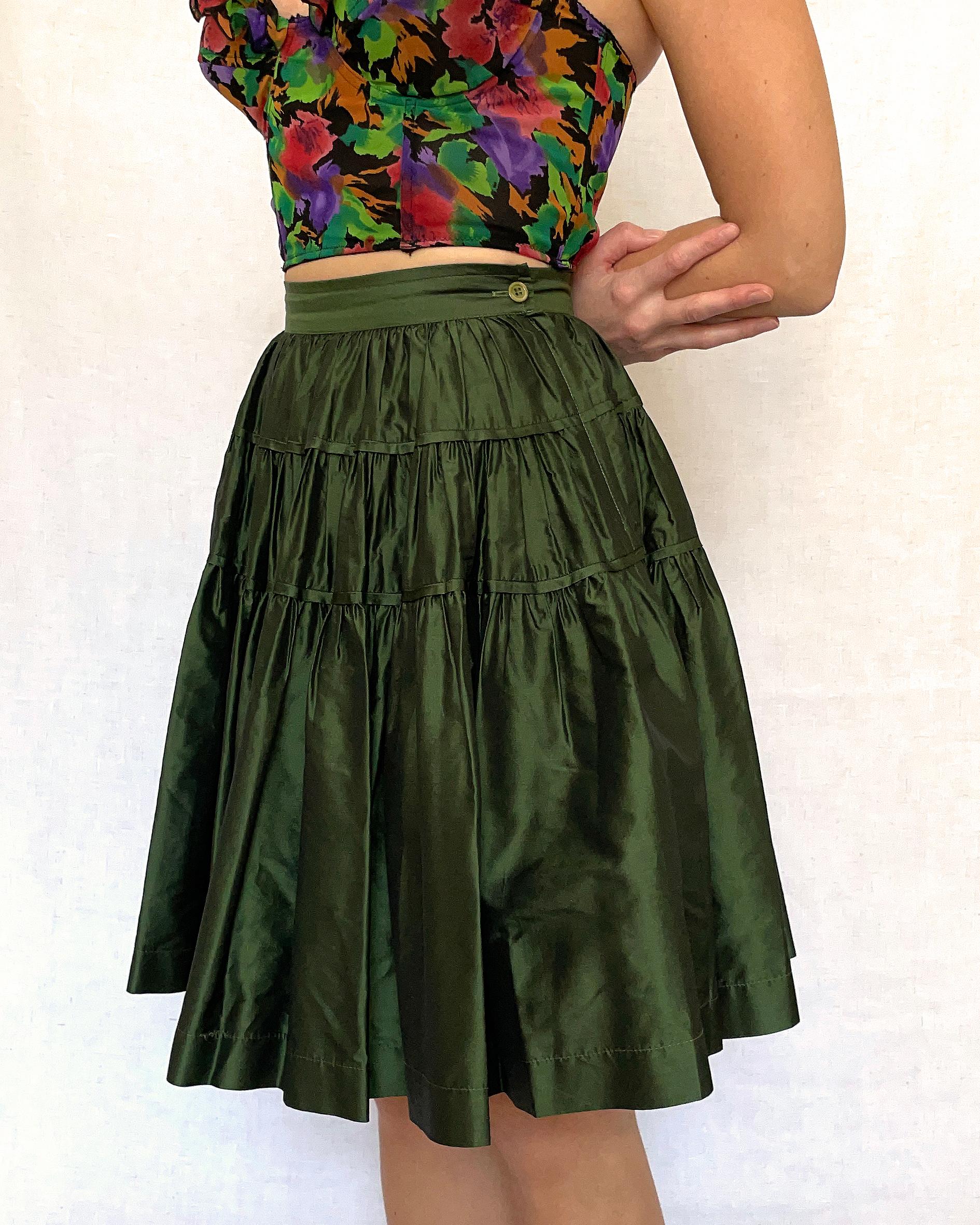 Vintage Kenzo Silk Taffeta Skirt: This skirt is a classic Kenzo silhouette, and a staple piece for any fashion collector. Made in France by Kenzo circa 1980s, it's constructed of 100% silk taffeta, with gathered tiers creating volume. There is a lot