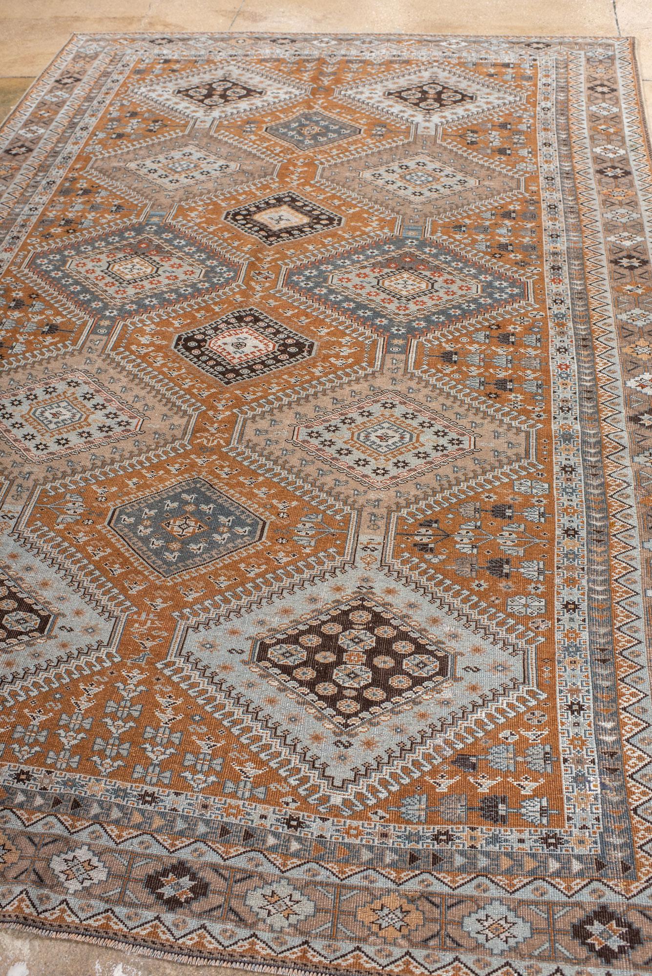 Persian Vintage Khamseh Shirz Small Carpet with a Rusty Field with Star and Dot Motives For Sale